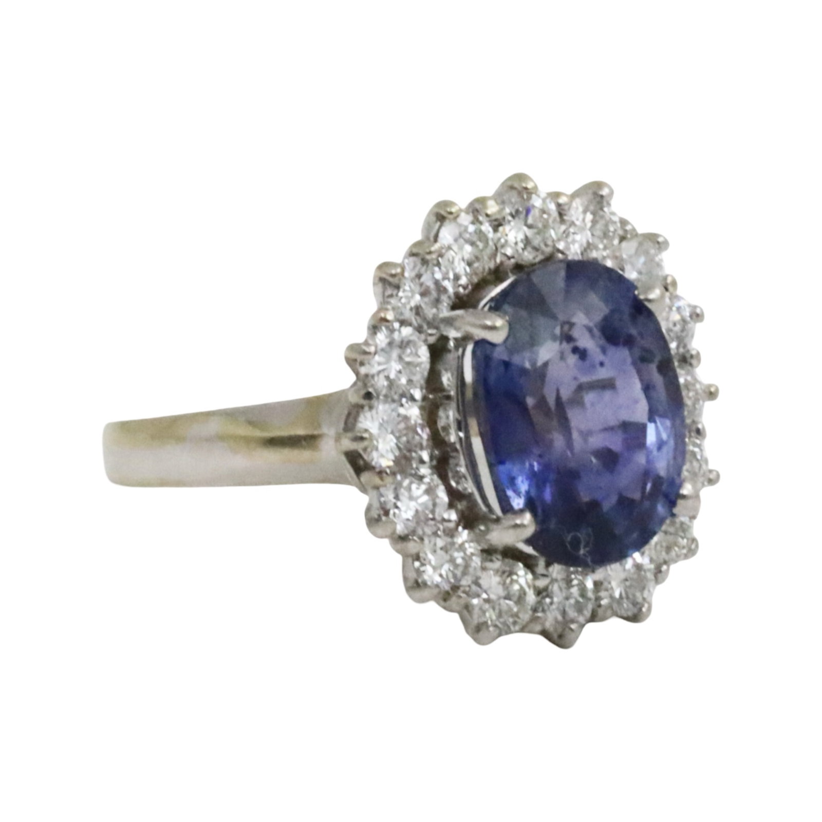 18K OVAL GIA SAPPHIRE AND DIAMOND RING: 18k white gold ring mounted with GIA certified sapphire center stone weighing 4.62cts and having 1.15cts of diamonds. size 6. total weight is 5.9grams. Please see all photos, appraisal, and GIA#522229