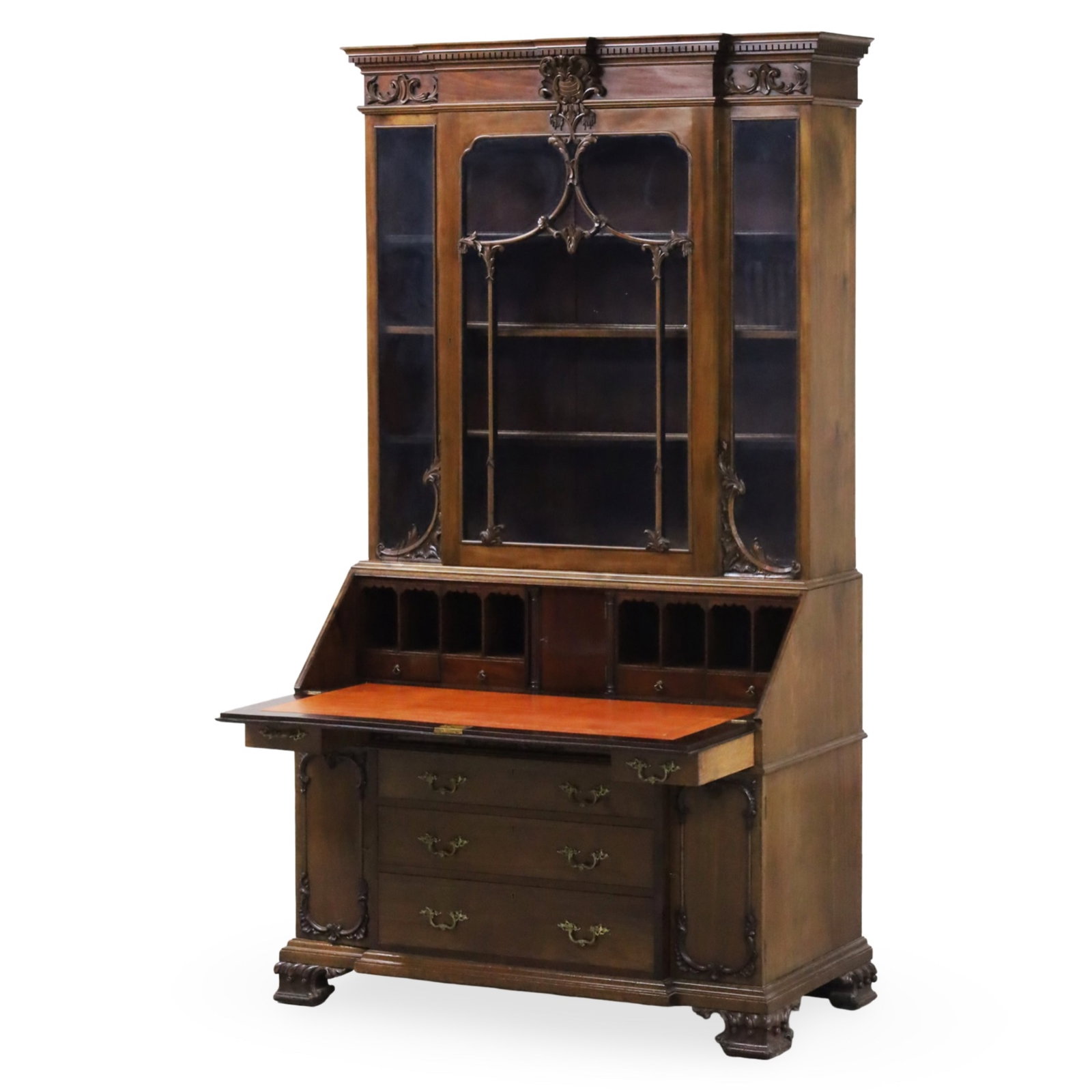 GEORGE III STYLE SECRETARY, HOBBS & CO, LONDON: English mahogany George III style secretary bookcase, the upper cabinet with stepped dentil mold cornice, cartouche and foliate carvings, and center glass door, the lower cabinet with fitted fall fron