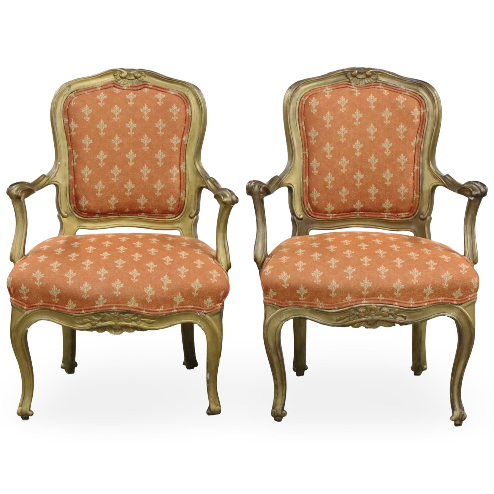 PR LOUIS XV STYLE GILTWOOD FAUTEUILS, 19TH C.: Pair of Louis XV style giltwood fauteuils or armchairs, having shell and C scroll crest rail, shaped arms, and floral carved apron, 19th century; 37.5"H 24"W 19"D; Condition: structurally sound, minor