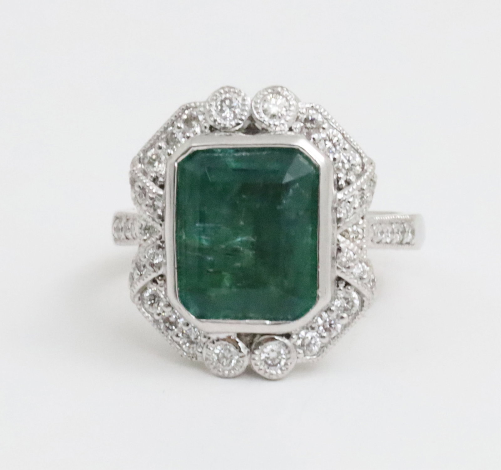 PLATINUM EMERALD AND DIAMOND RING - 2