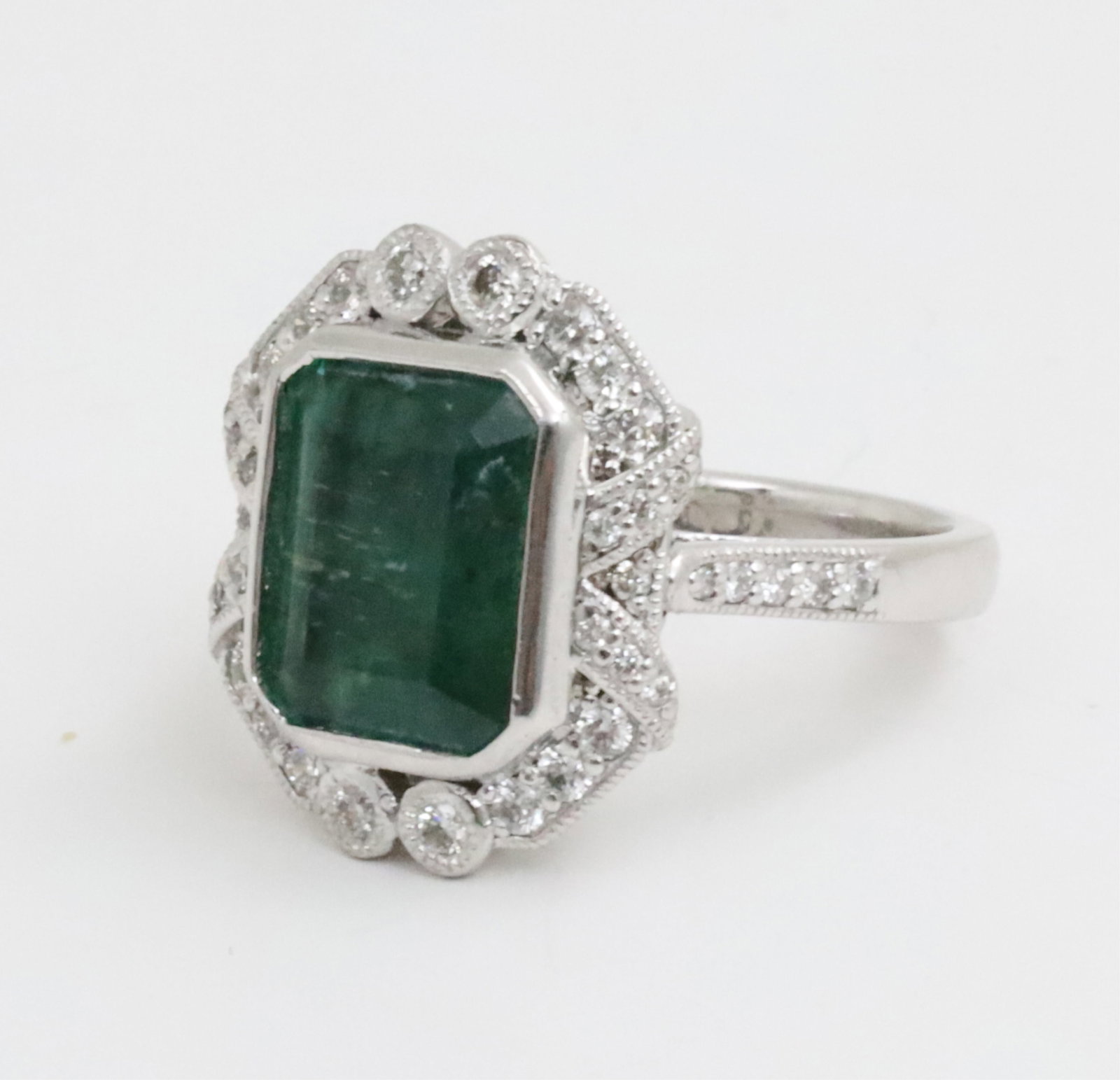 PLATINUM EMERALD AND DIAMOND RING - 3