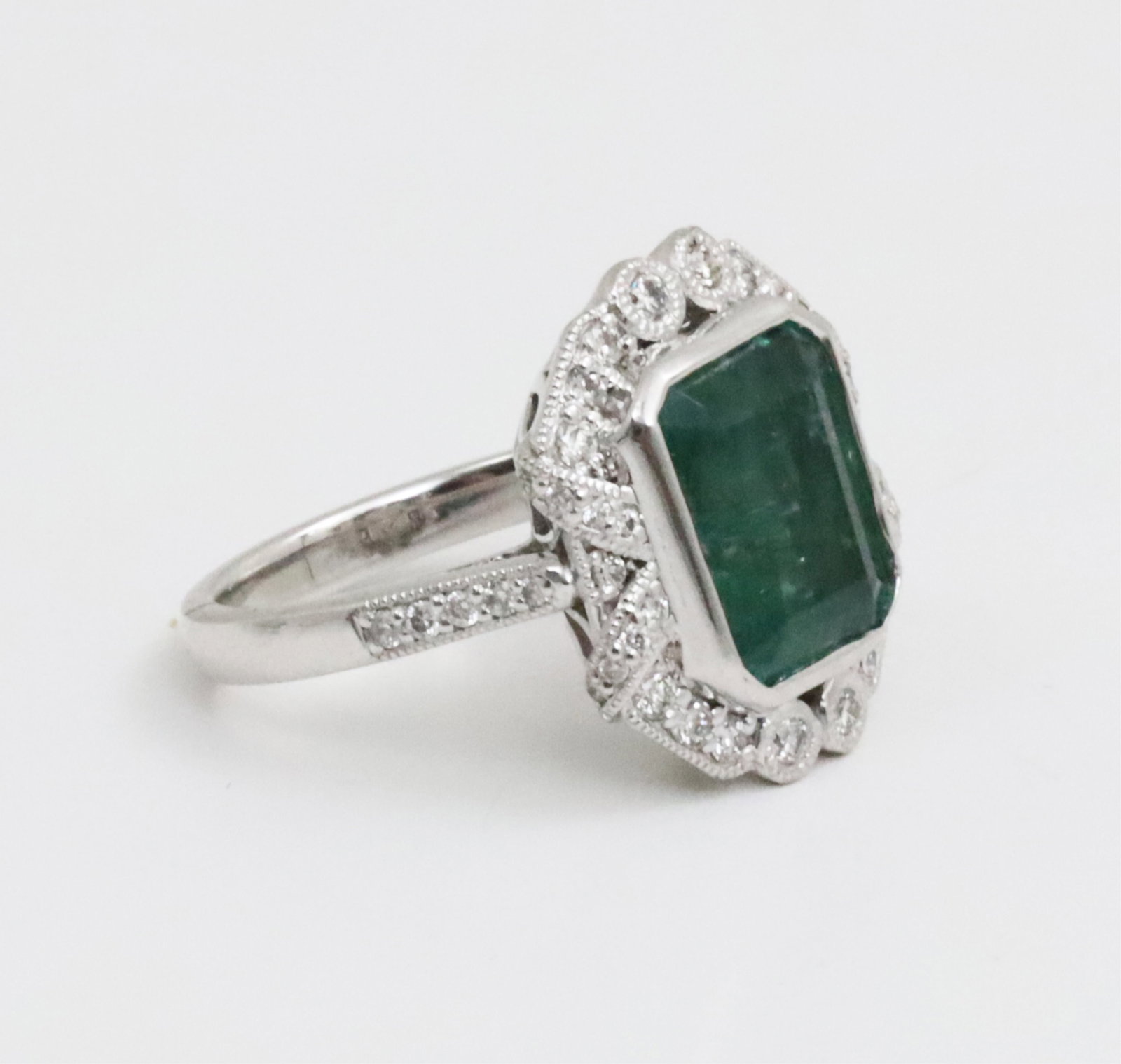 PLATINUM EMERALD AND DIAMOND RING - 4