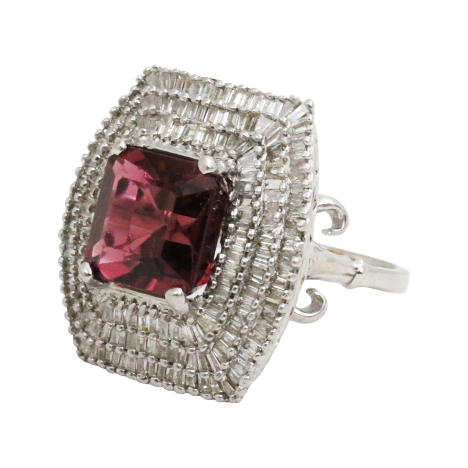 18K RUBELLITE TOURMANLINE & DIA RING: 18k white gold natural rubellite tourmaline and diamond ring with 6.42 center stone and 1.91 cts of surrounding diamonds. total weight is 13.4 grams. size 6.5. Please see all photos and appraisal. Not