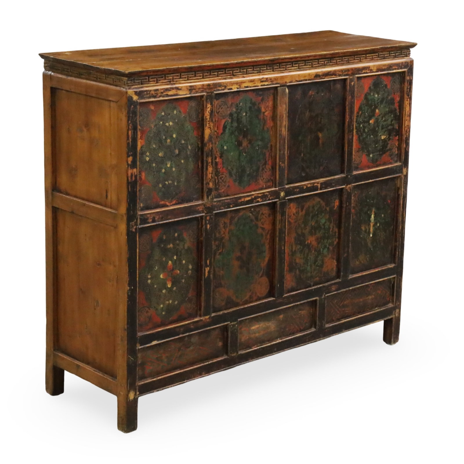 TIBETAN POLYCHROME CABINET, 19TH C.: Tibetan polychrome paneled camphor wood cabinet with hand painted lotus decoration, late 19th century; 42"H 45"W 16.5"D
