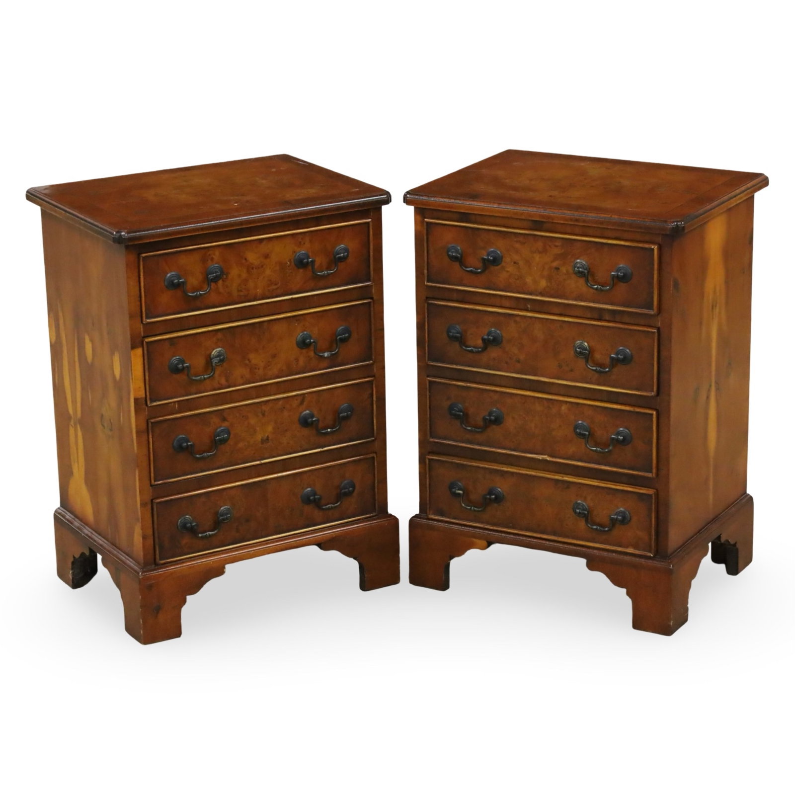 PR GEORGIAN STYLE YEW WOOD CHEST OF DRAWERS: Pair of Georgian style yew wood chests, having four drawers, raised on bracket feet, 20th century; each 24.5"H 17.5"W 13.5"D