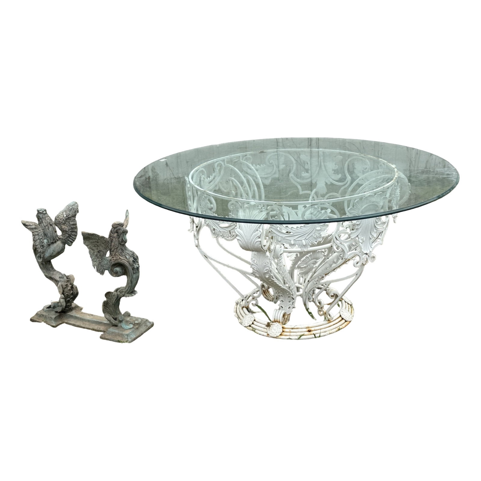 2PC GARDEN FURNITURE, CAST ALUMINUM, BRONZE: Two piece lot of garden or patio furniture, including a cast aluminum glass top dining table, the base having ornate pierced scroll leaf design, along with a bronze flanking rooster side table, missin