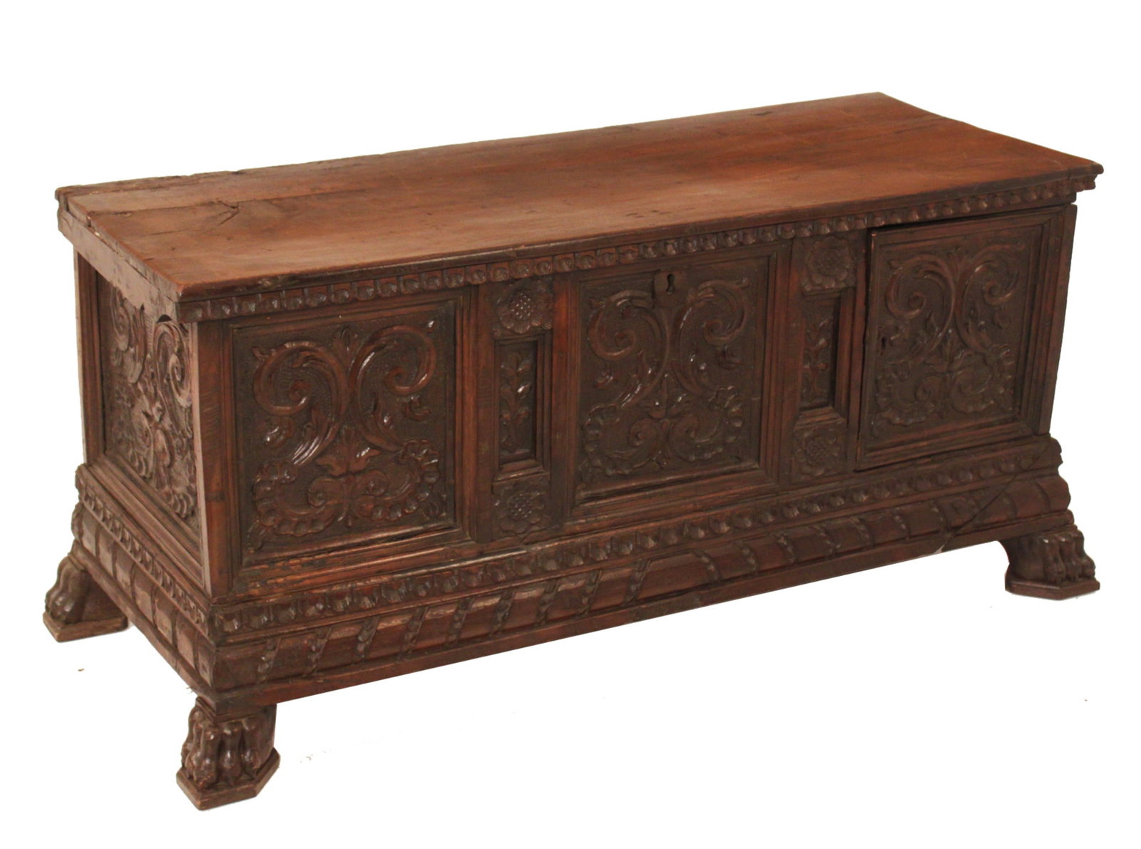 17TH/18TH C. ITALIAN RENAISSANCE CASSONE: Intricately carved walnut Italian Renaissance cassone chest, having lift top and front cabinet with three fitted interior drawers; 25"H 55"W 22"D; Condition: areas of worming, chips, gouges, and