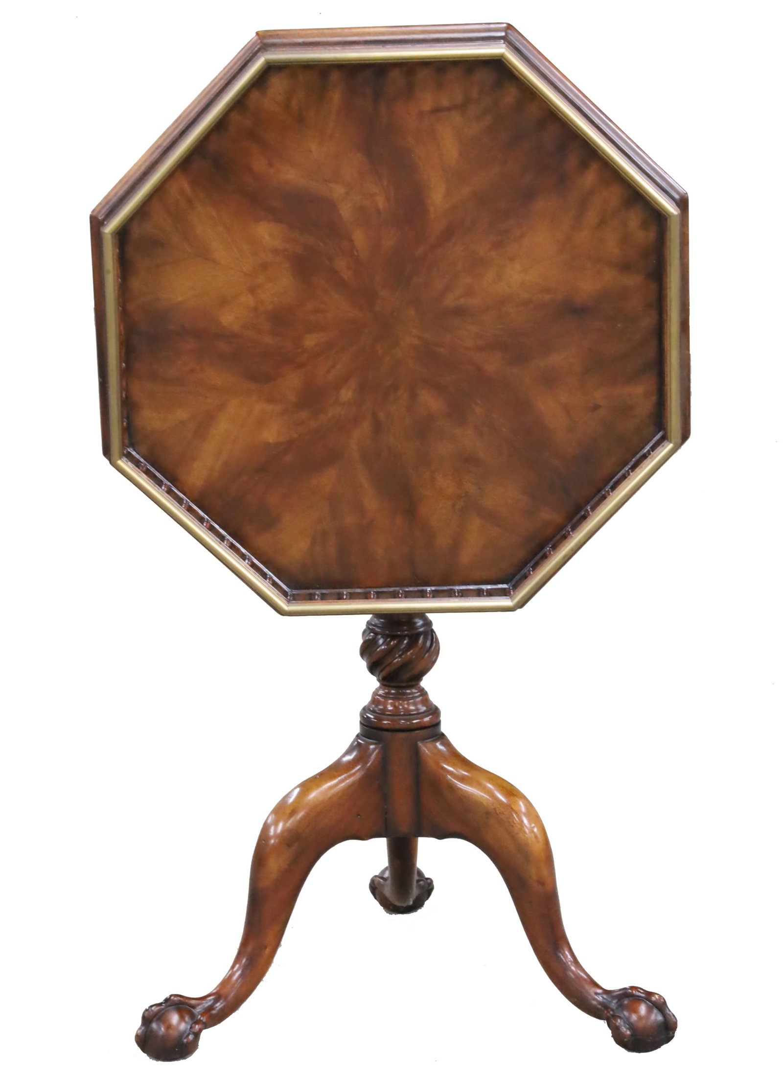 THEO. ALEXANDER GEORGIAN STYLE TRIPOD TABLE: Georgian style mahogany tripod tilt table with octagon spindle carved gallery with brass cap rail, raised on spiral urn formed column, resting on ball and claw feet, Theodore Alexander plaque on rever