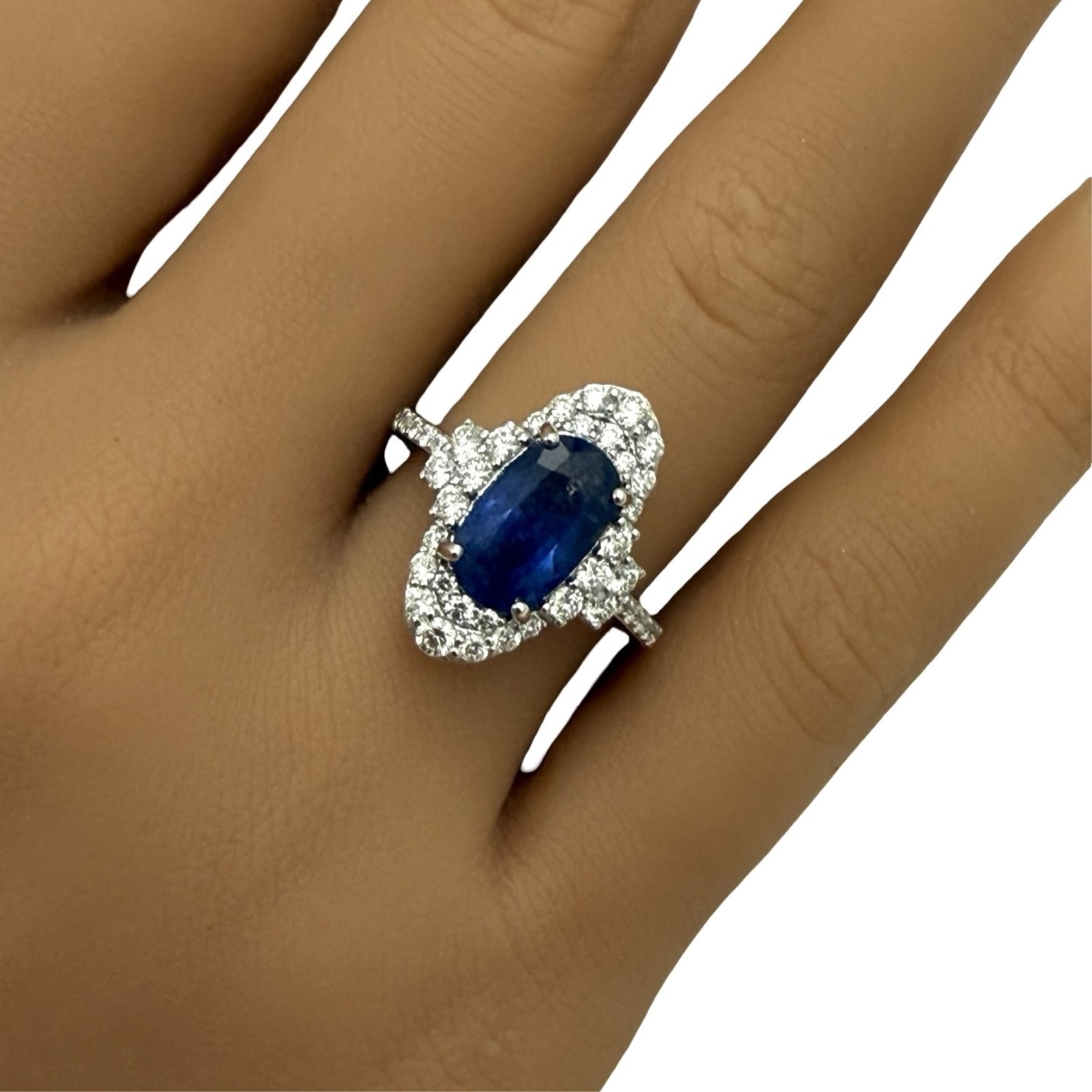 PLATINUM SAPHIRE AND DIAMOND RING, GIA: Platinum Sri Lanka blue sapphire and diamond ring with cushion cut natural 3.25ct center stone surrounded by .83cts VS1-VS2 round brilliant diamonds. size 6.75 . gross weight is 6.8grams . Please see 