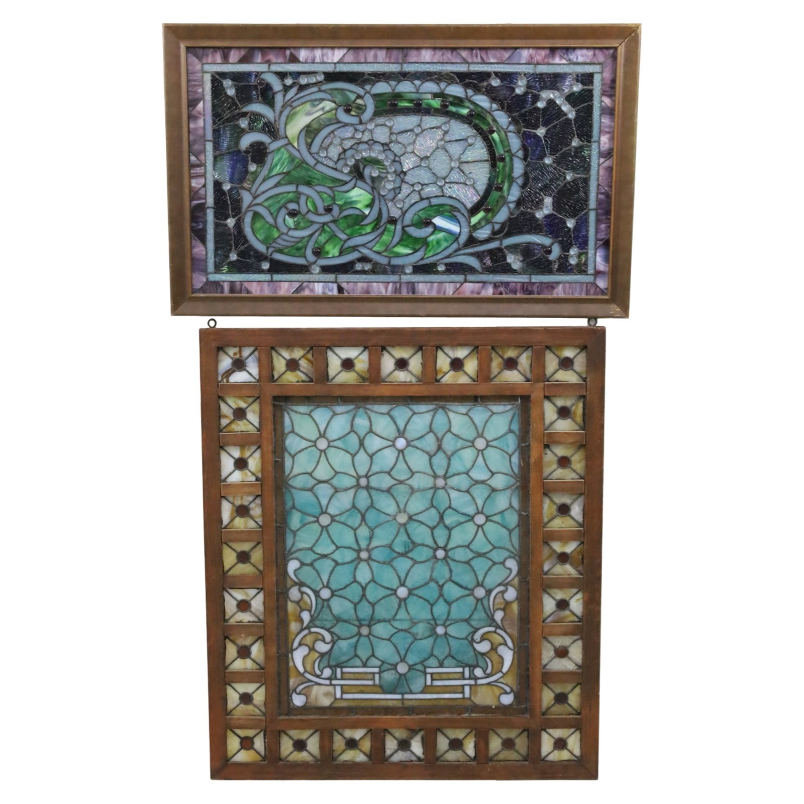 TWO LEADED ART GLASS WINDOWS: Group of two leaded art glass windows, early and mid 20th century; 38"H 33"W and 23"H 36.5"W