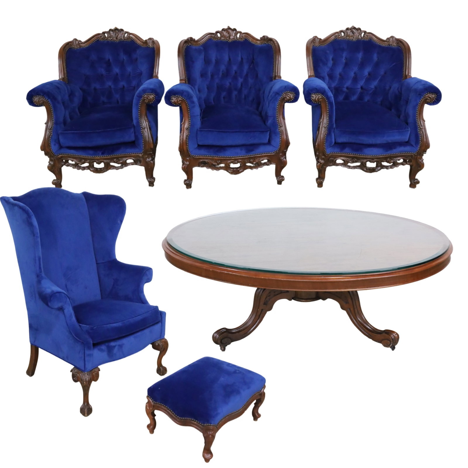 6PC BLUE VELVET PARLOR SUITE: Six piece parlor suite of furniture, including three Louis XV style bergeres, Chippendale style wingback chair, and stool, all covered in matching blue velvet upholstery, along with a mahogany low tab