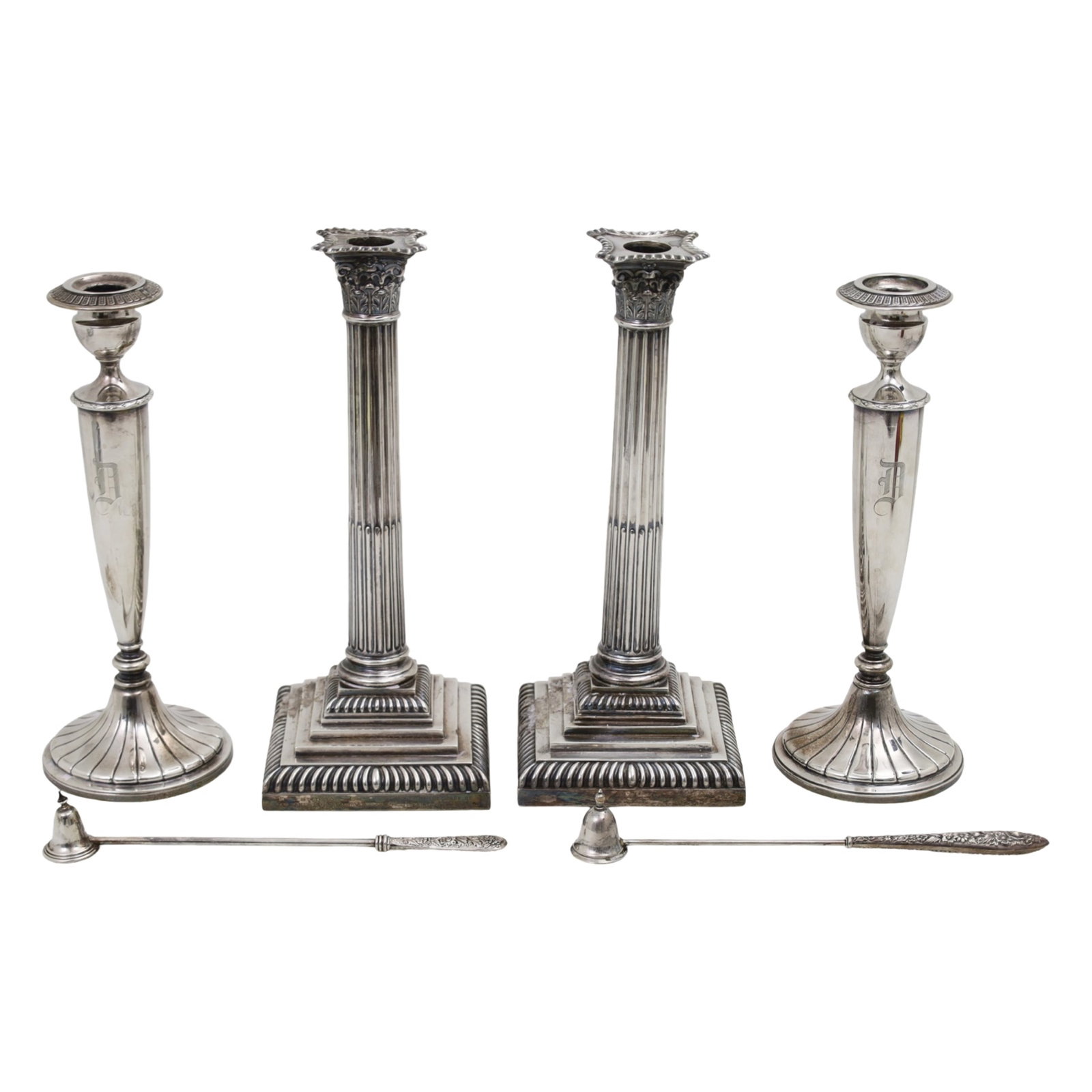 TWO PAIRS OF WEIGHTED STERLING SILVER CANDLESTICKS: Two pairs of weighted sterling silver candelsticks, including one pair of Corinthian column form, Sheffield duty and date mark 1924, inscribed as a wedding gift in 1928 at foot, along with another