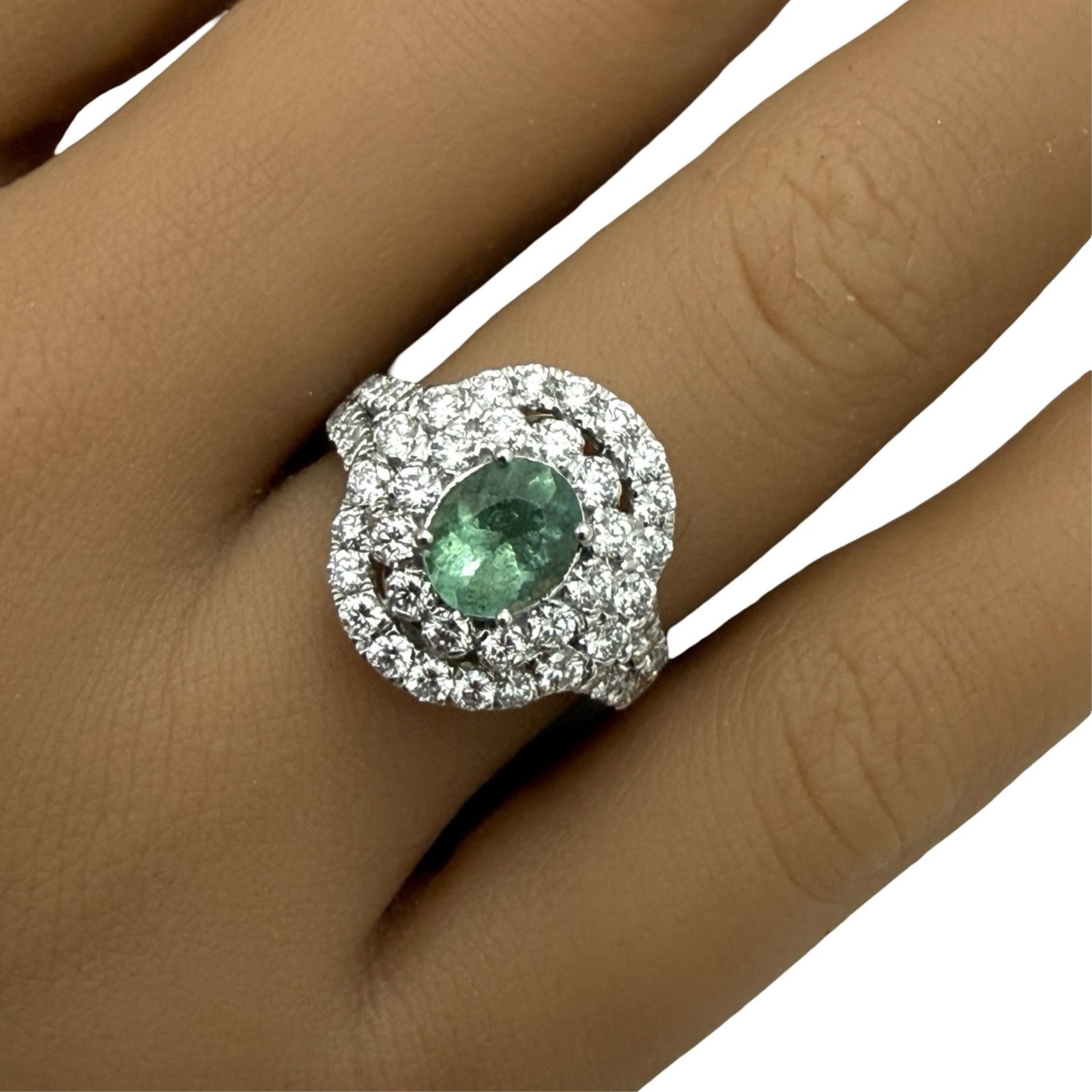 GIA PARAIBA TOURMALINE AND DIAMOND RING: Platinum paraiba tourmaline and diamond ring having GIA certified .93ct excellent green center stone and 1.32cts of round brillaint cut VS1-VS2 diamonds. size 6.25. total weight 6.3 grams. Please see 