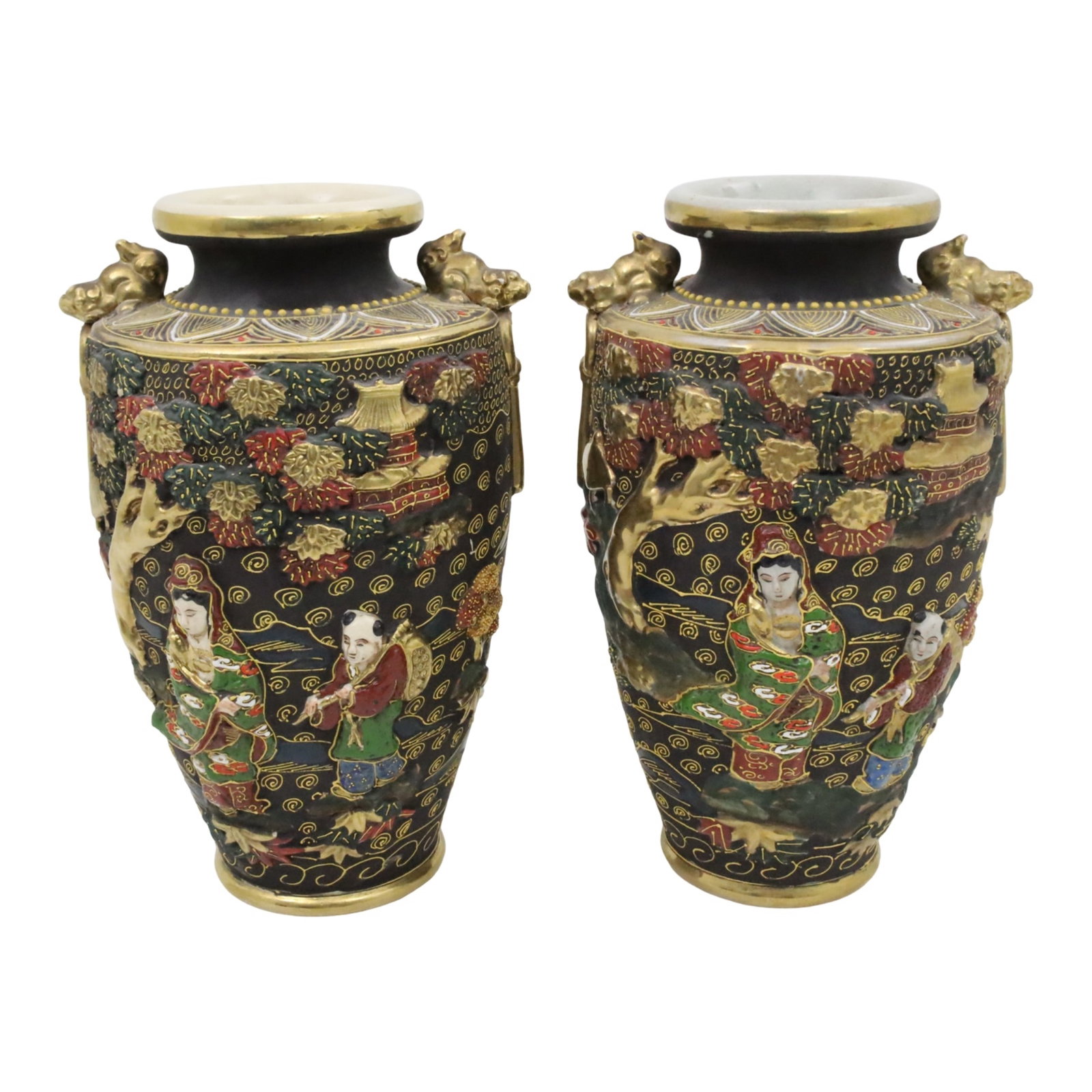 PR JAPANESE SATSUMA VASES: Pair of Japanese Satsuma porcelain vases having gilt overlay foo dog surmounts and raised relief figural reserves, marked on reverse, 20th century; 13"H