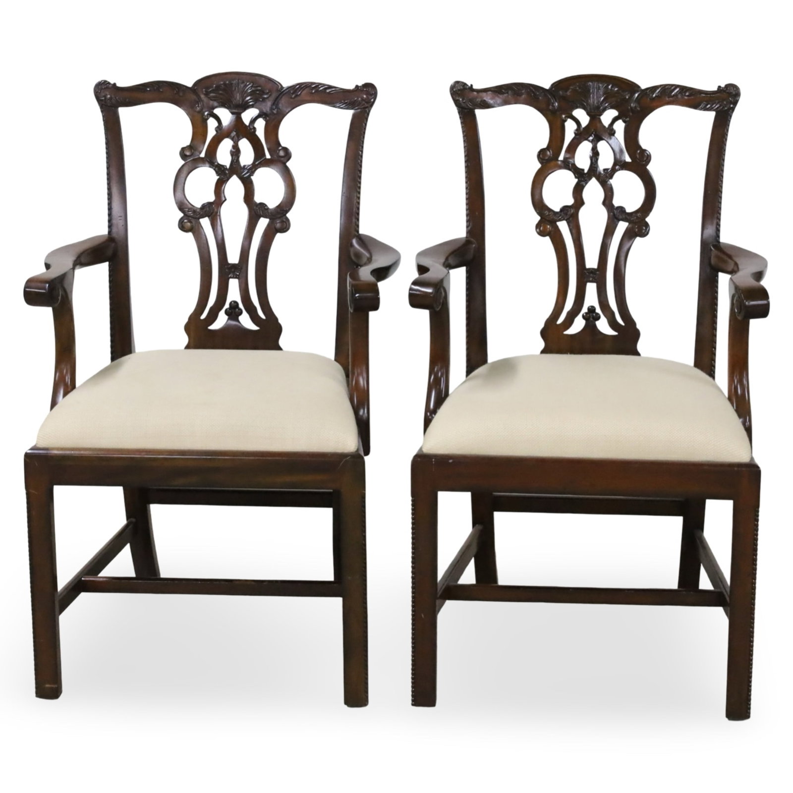 PR CHIPPENDALE STYLE ARMCHAIRS: Pair of Chippendale style armchairs having carved crest rail and open work splats, 20th century; 39"H 22"W 20"D
