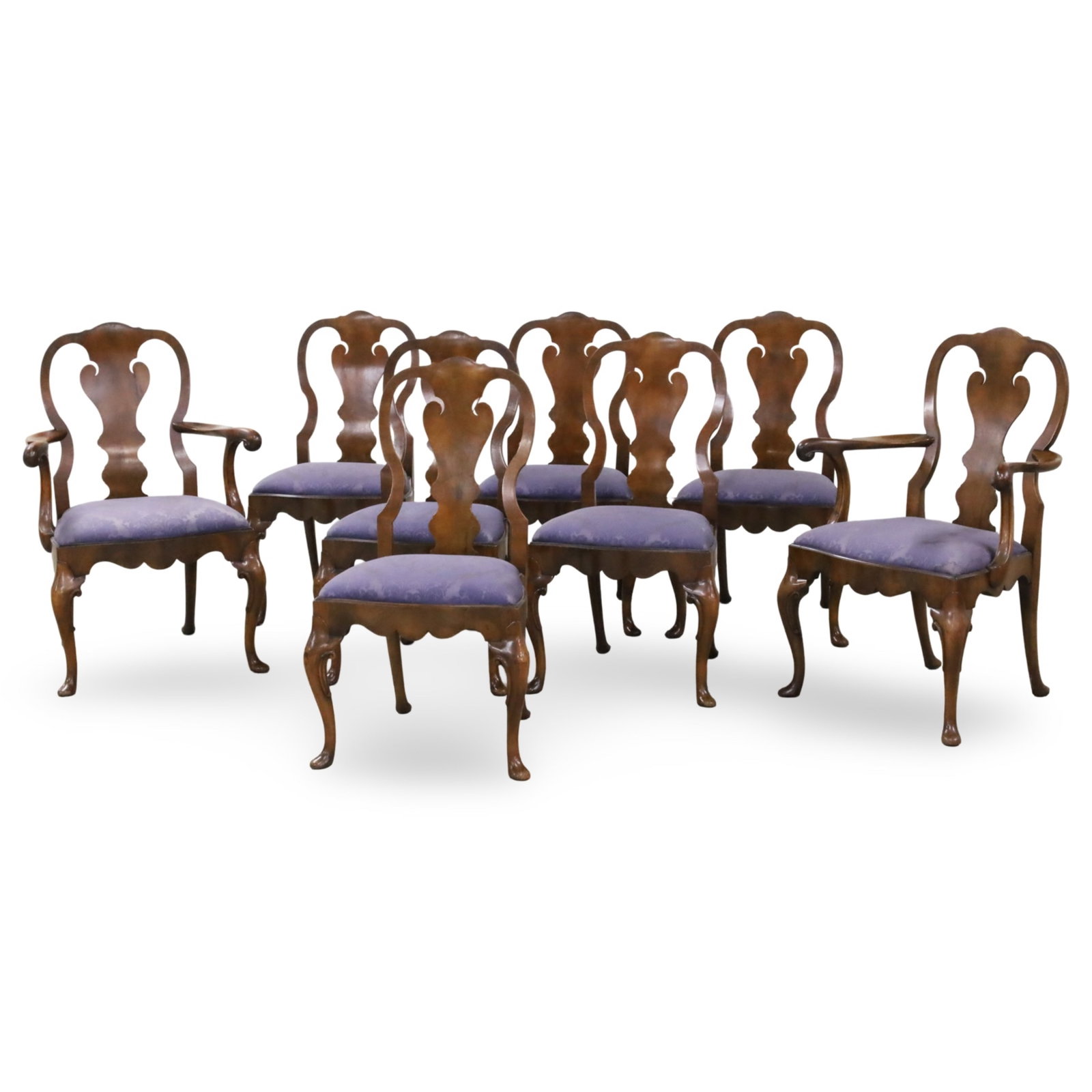 SET OF 8 QUEEN ANNE STYLE DINING CHAIRS: Set of eight Queen Anne style mahogany dining chairs, consisting of six side chairs and pair of armchairs, having shaped center splats and aprons, raised on cabriole legs resting on pad feet, early