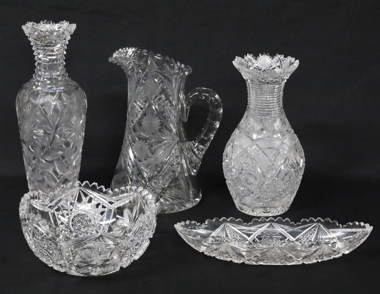 5PC LOT OF AMERICAN CUT CRYSTAL: Five piece lot of antique American cut crystal, including pitcher, two vases, bowl, and oval dish; largest vase 12.5"H pitcher 10.5"H