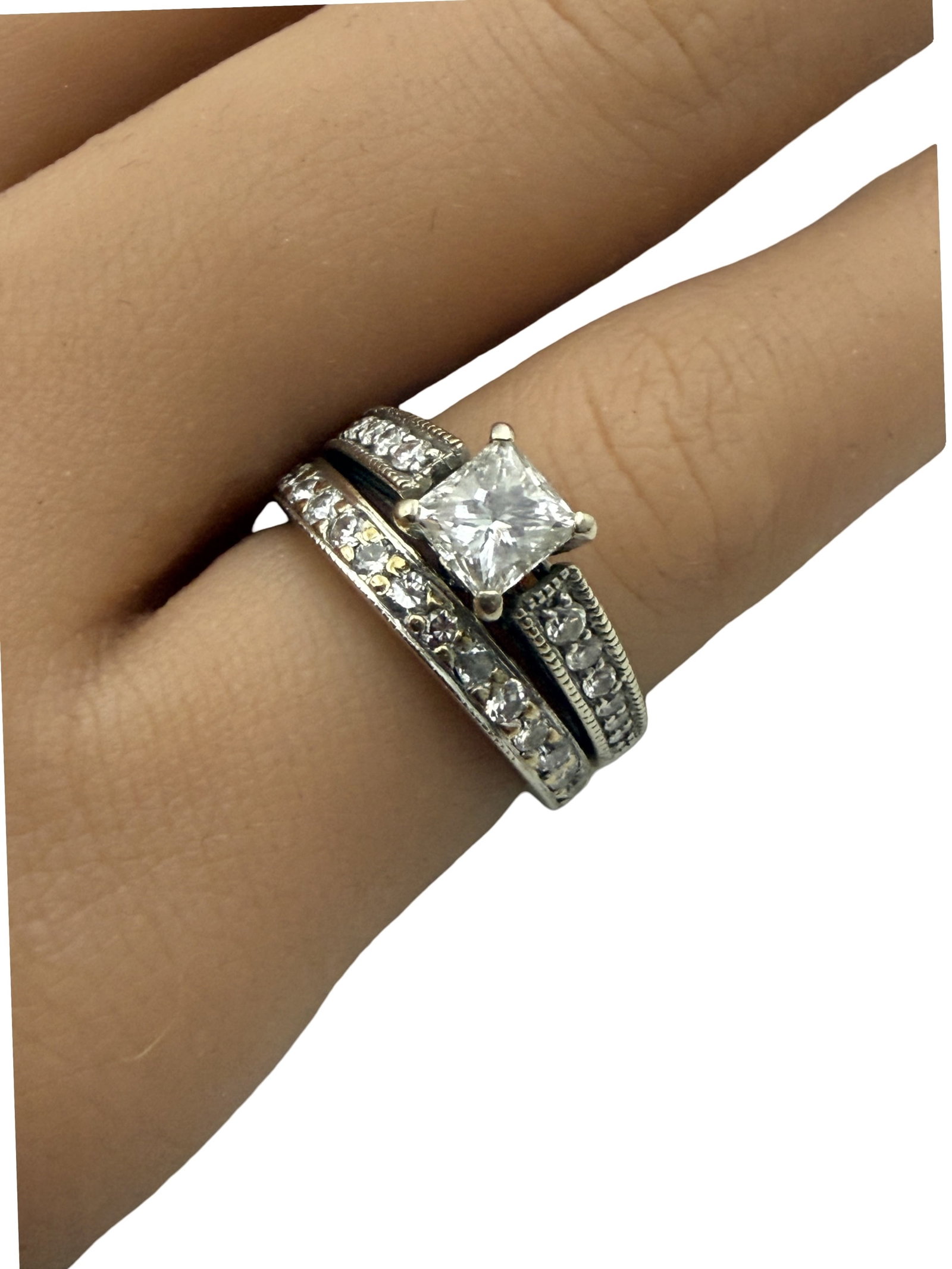 DIAMOND WEDDING SET: Two 18k hand made wedding bands with 8 full cut diamonds in each and .32ct center stone, SI1, I color . size 4. marked "FOREVER" on inside of band. Note: this lot must be paid by bank wire transfer