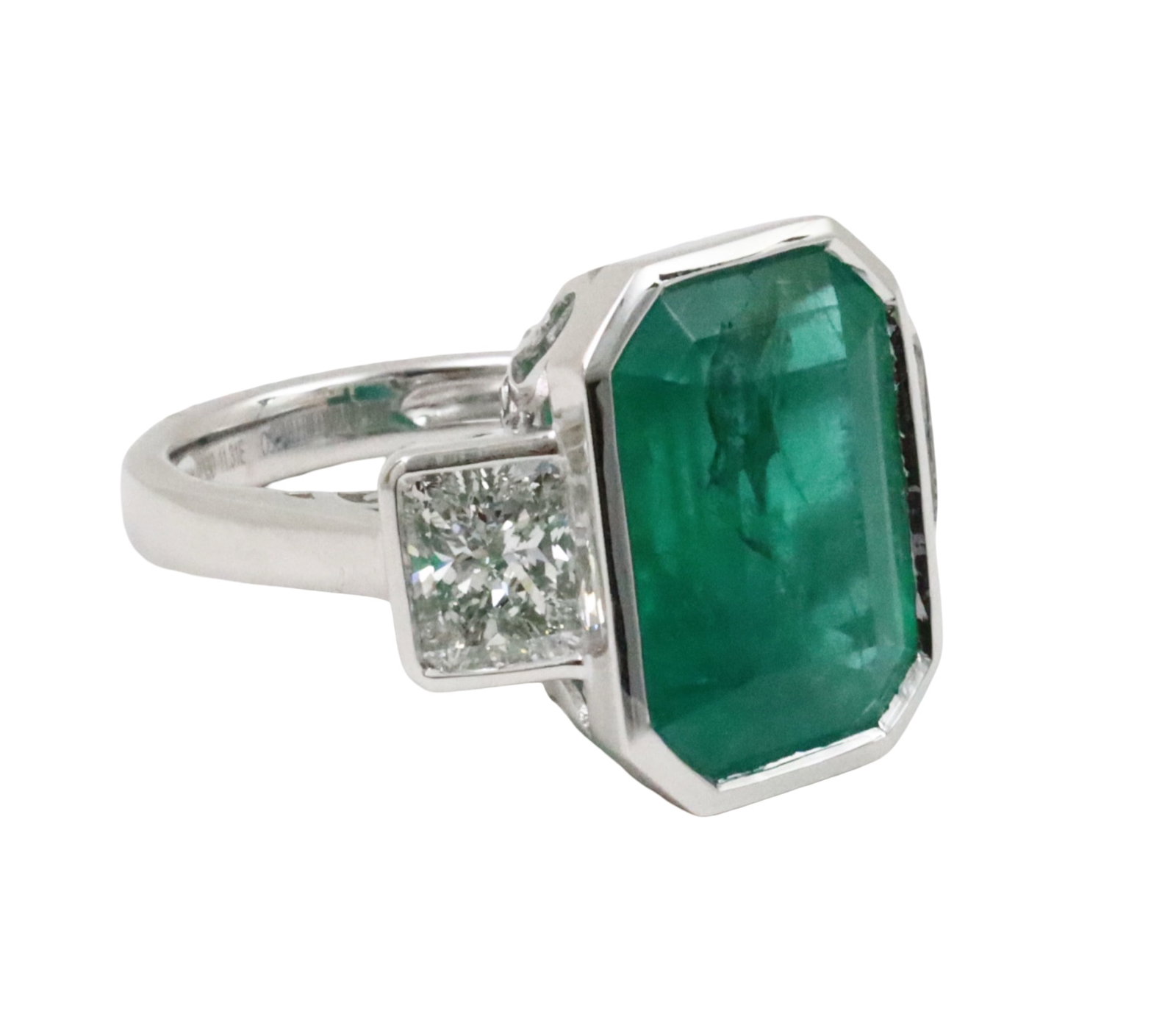 PLATINUM NATURAL BRAZILIAN EMERALD & DIA RING: Platinum natural braizillian emerald ring with 11.31ct GIA center stone flanked by 2 GIA certified radiant cut diamonds 2.11 ct total. gross weight is 13.2 grams. Please see all photos, apprasial,