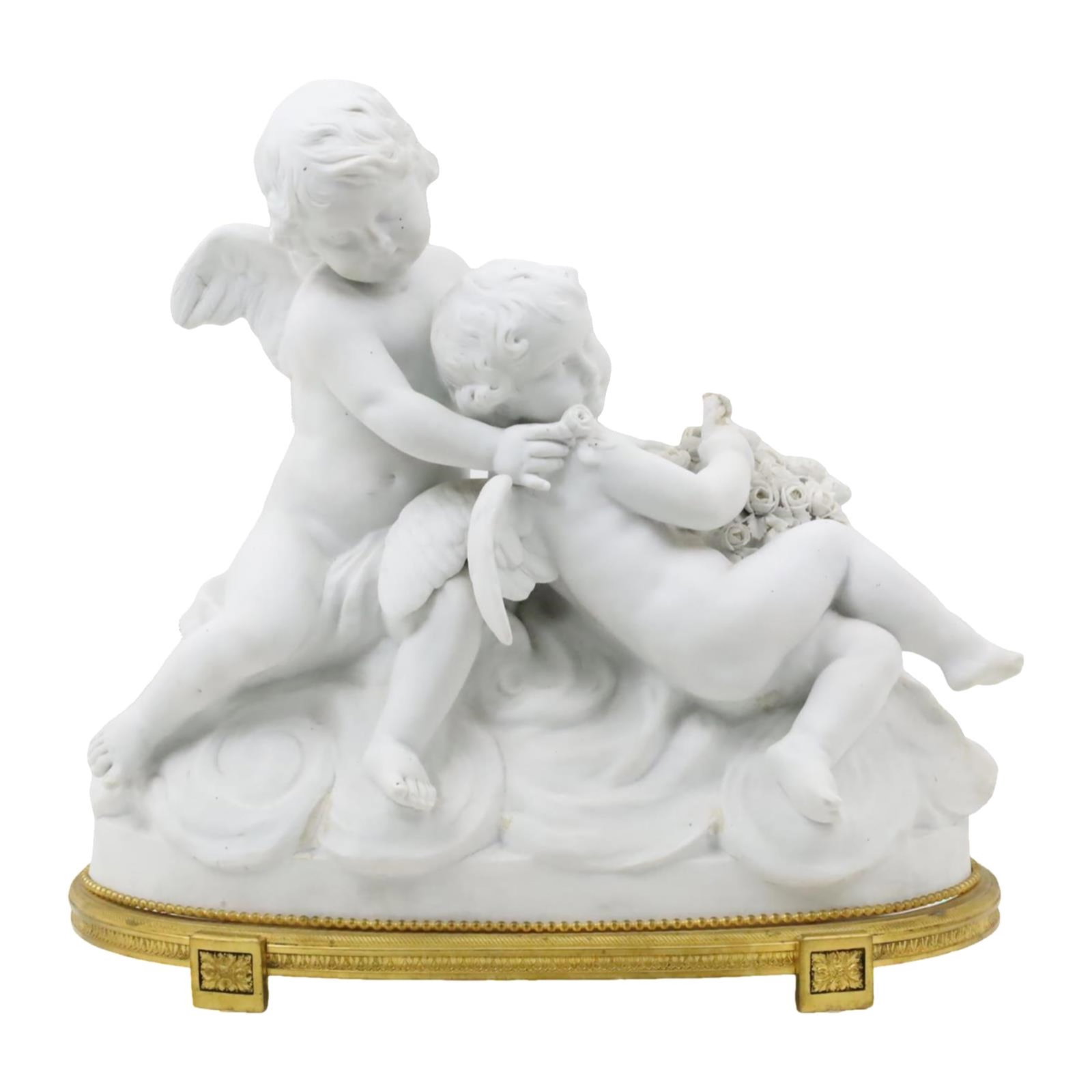 FRENCH BISQUE PORCELAIN CHERUBS SCULPTURE , 19TH: C. Antique French bisque porcelain figure of two cupids with floral basket resting on a conforming dore bronze stand; C.1880; 16.5"H 17.5"W 9"D; condition: missing floral bouquet of reclining cupid's
