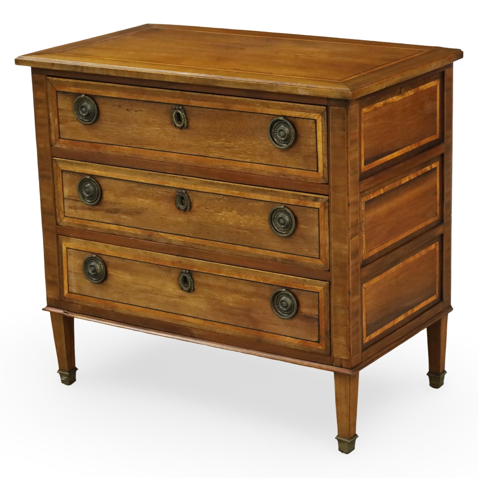 LOUIS XVI STYLE MAHOGANY CHEST OF DRAWERS: Louis XVI style chest of drawers, the mahogany straight front case housing three crossbanded drawers with bronze hardware, raised on tapered legs; 33"H 36"W 20"D