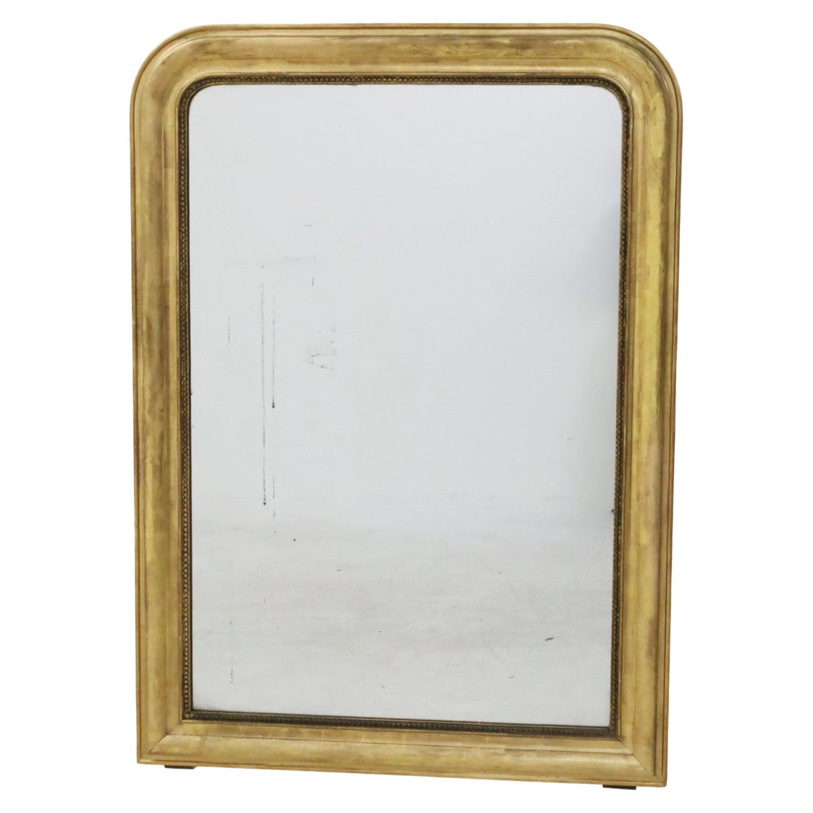 LOUIS PHILIPPE GILTWOOD MIRROR, 19TH C.: Large Louis Philippe giltwood mirror, the frame with subtle floral carvings and inner beaded border, 19th century; 57"H 41"W; Condition: two streaks of silvering loss to mirror at center left, see