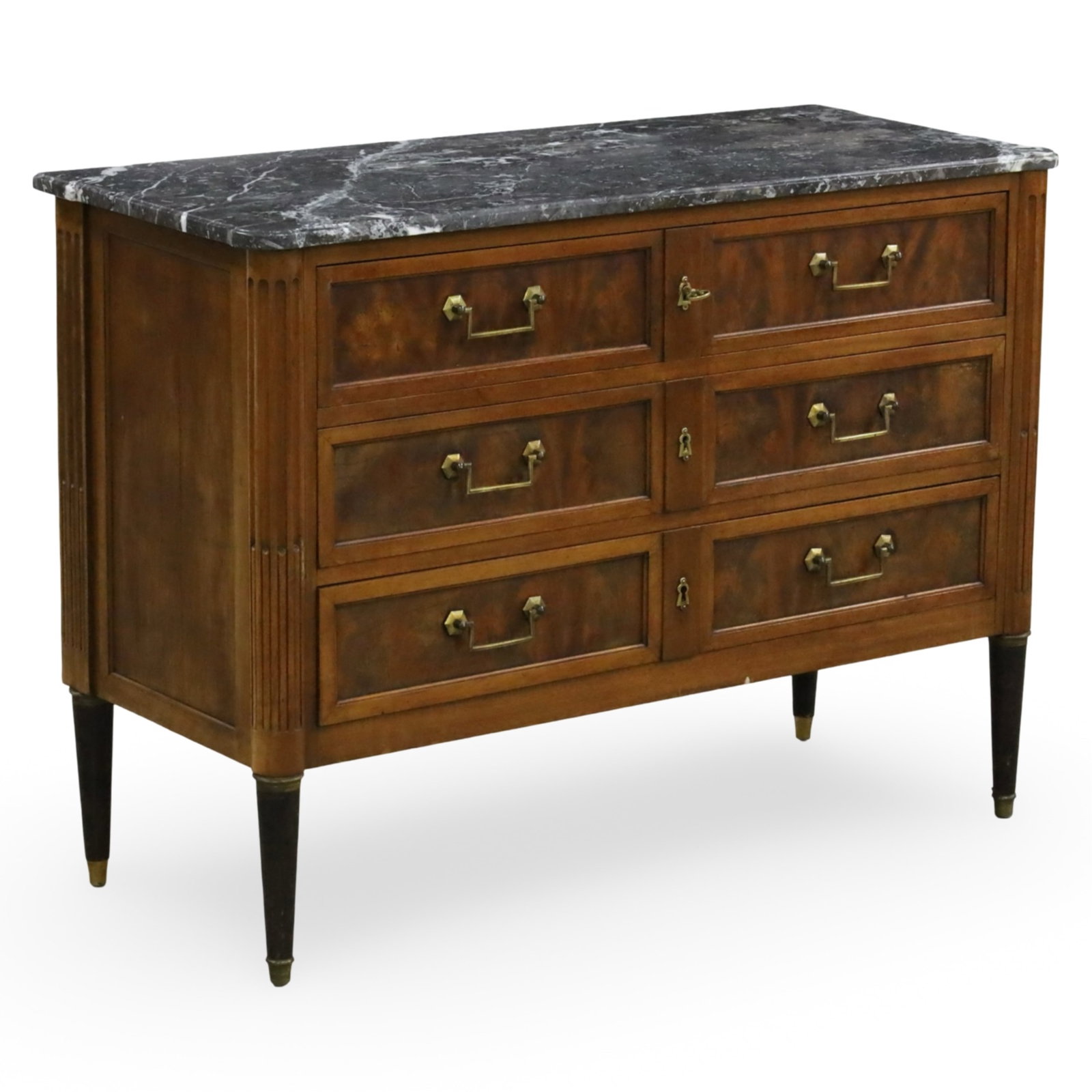 LOUIS XVI STYLE MARBLE TOP COMMODE: Louis XVI style walnut commode or chest of drawers, the walnut case having variegated grey marble top and fluted columns supporting three drawers, raised on tapered legs, late 19th century; 34"H 46"W 