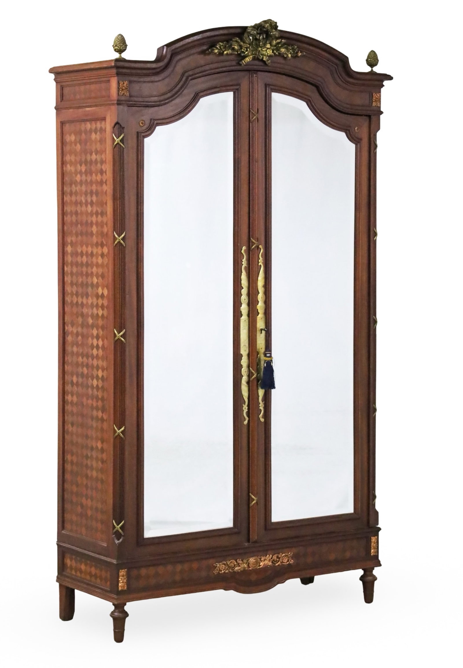 LOUIS XVI MIRROR DOOR ARMOIRE: Louis XVI style oak and marquetry mirror door armoire, having gilt bronze pineapple finials and crest rail; 95"H 51"W 20"D