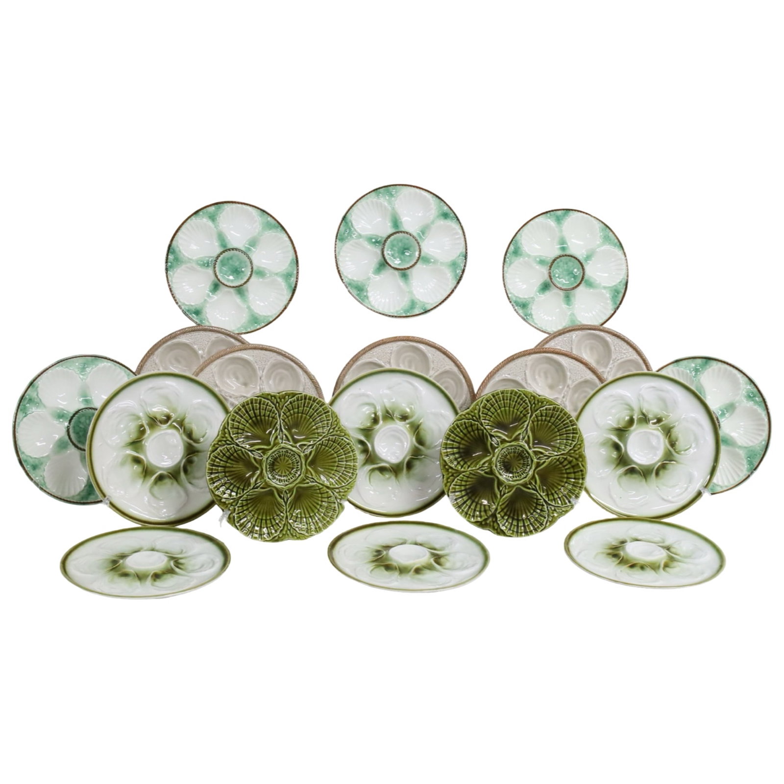 18 FRENCH PORCELAIN OYSTER PLATES: Set of 18 oyster plates in 3 green and tan in different patterns icluding Faience and Chantilly . largest 10" dia.