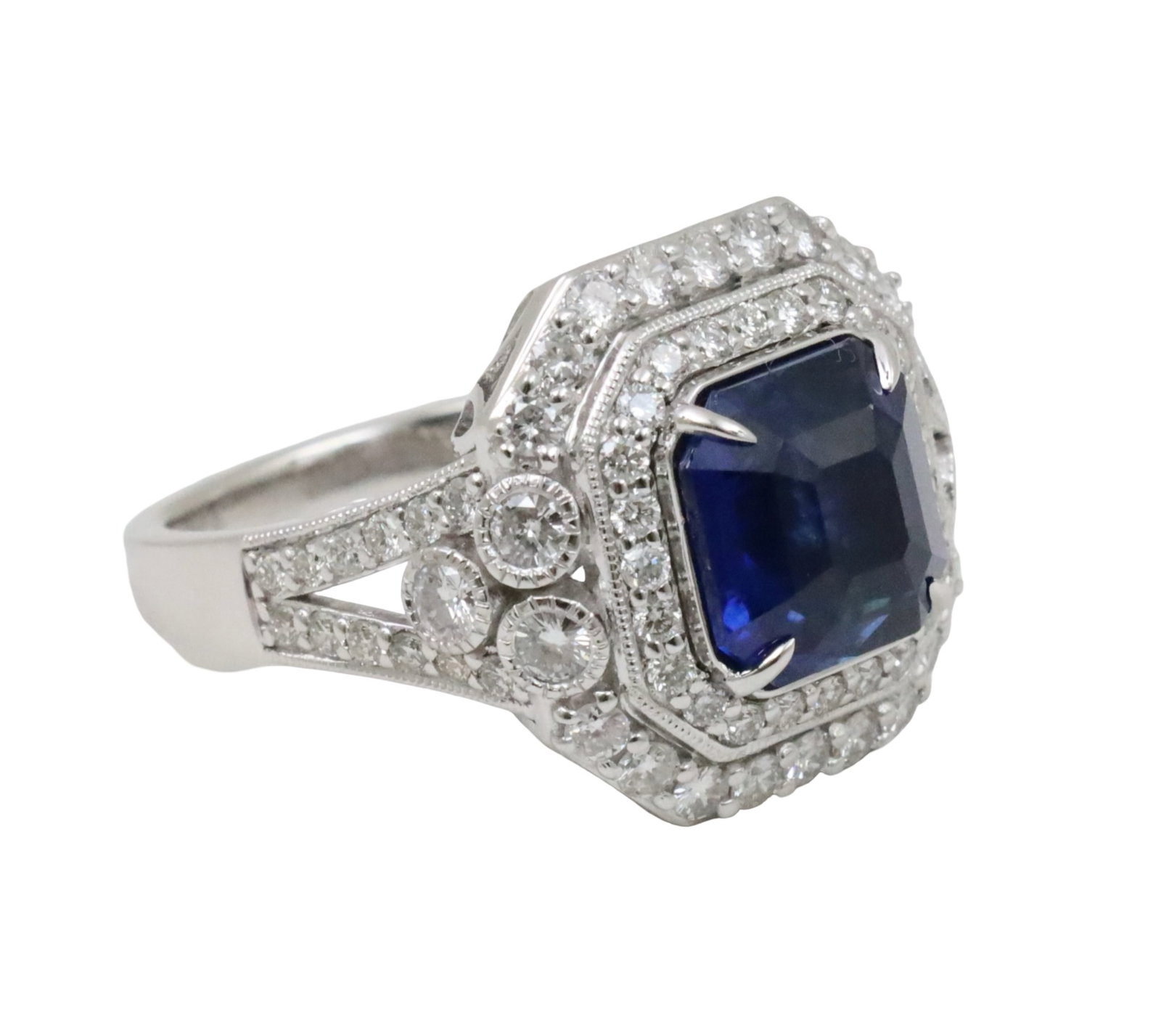 PLATINUM SAPPHIRE AND DIAMOND RING, GIA: Platinum ring with GIA natural blue sapphire weighing 4.74ct surrounded by 1.27cts of VS1-VS2 diamonds. size 6.75. Please see all photos, appraisal, and GIA#6237876357. Note: this lot must be paid by