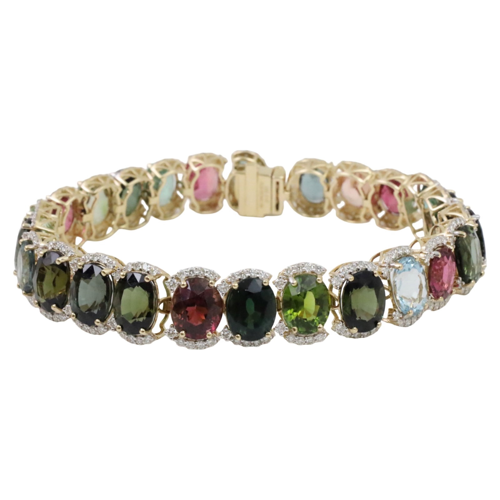 14K MULTICOLOR TOURMALINE AND DIAMOND BRACELET: 14k two tone gold multicolor and diamond bracelet having 47.49cts of oval brilliant tourmalines and 2.80cts of VS1-VS2 diamonds. total weight is 14.8grams. Length is 7in. Please see all photos and app