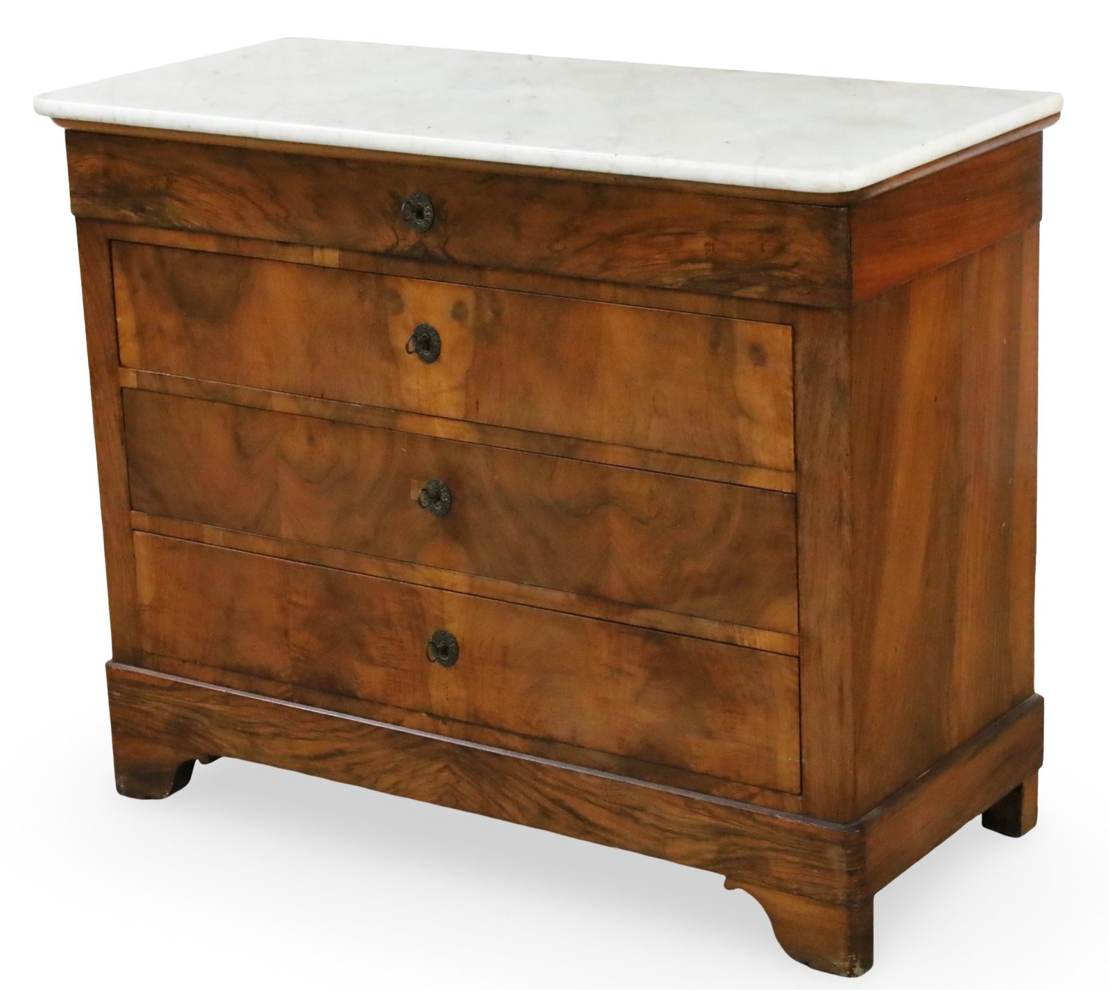 LOUIS PHILIPPE WALNUT COMMODE: Louis Philippe commode, having a white marble top, the case with bookmatched walnut, having four drawers resting on ogee bracket feet; 36"H 45"W 20"D