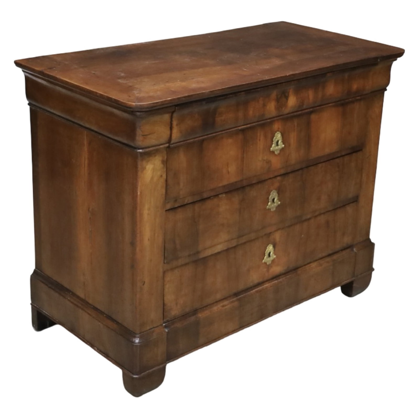 FRENCH LOUIS PHILIPPE WALNUT CHEST: French Louis Philippe walnut chest having a molded top above four graduated drawers with brass escutcheons, raised on bun feet. Measures 46"W x 23.5"D x 36"H.