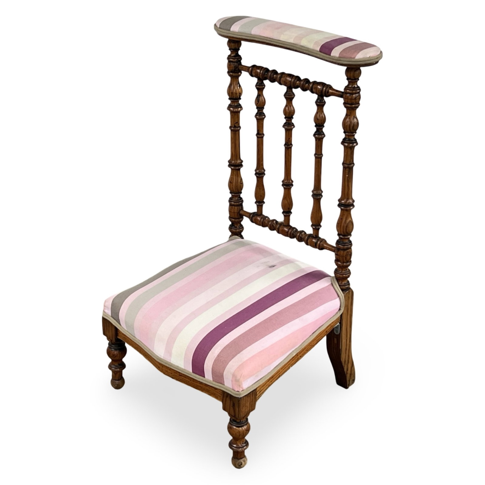 FRENCH PINE AND NEEDEPOINT PRIE DIEU: French pine prie dieu or prayer chair, frame with turned stiles and back rest, the crest rail and seat with striped upholstery; 35.5"H 22"W 18"D