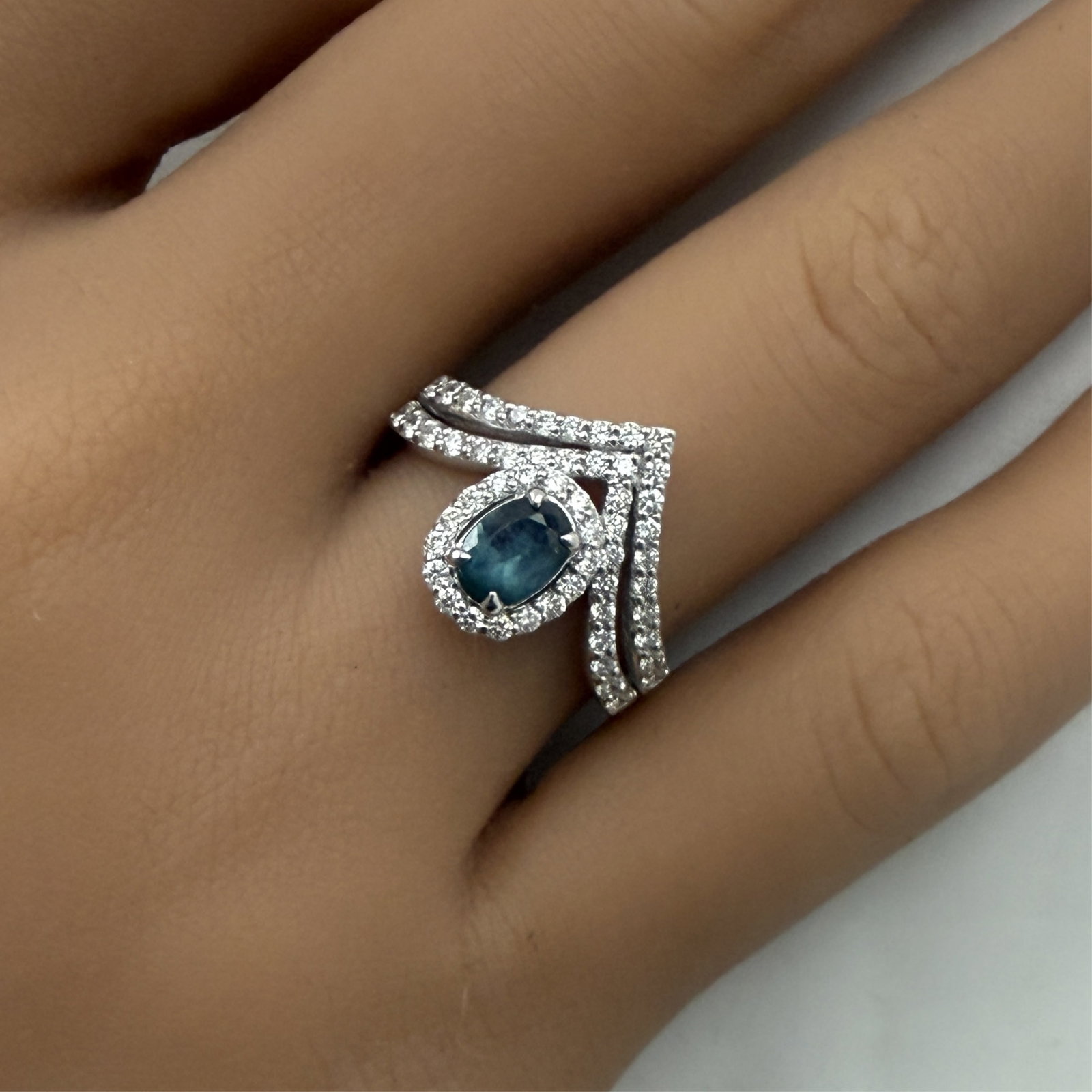 PLAT COLOR CHANGE ALEXANDRITE AND DIA RING, GIA: Platinum ring with natural color change oval alexandrite weighing .59ct surrounded by .60cts of VS1-VS2 diamonds. size 6.75 gross weight is 6.9grams. Please see all photos, appraisal, and