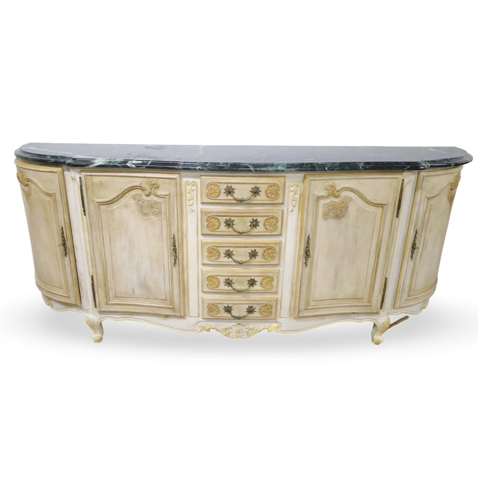 FRENCH PROVINCIAL MARBLE TOP SIDEBOARD: French Provincial style painted buffet or sideboard featuring a shaped verde marble top above five center drawers flanked by four paneled cabinet doors. The bowed case is accented with carved