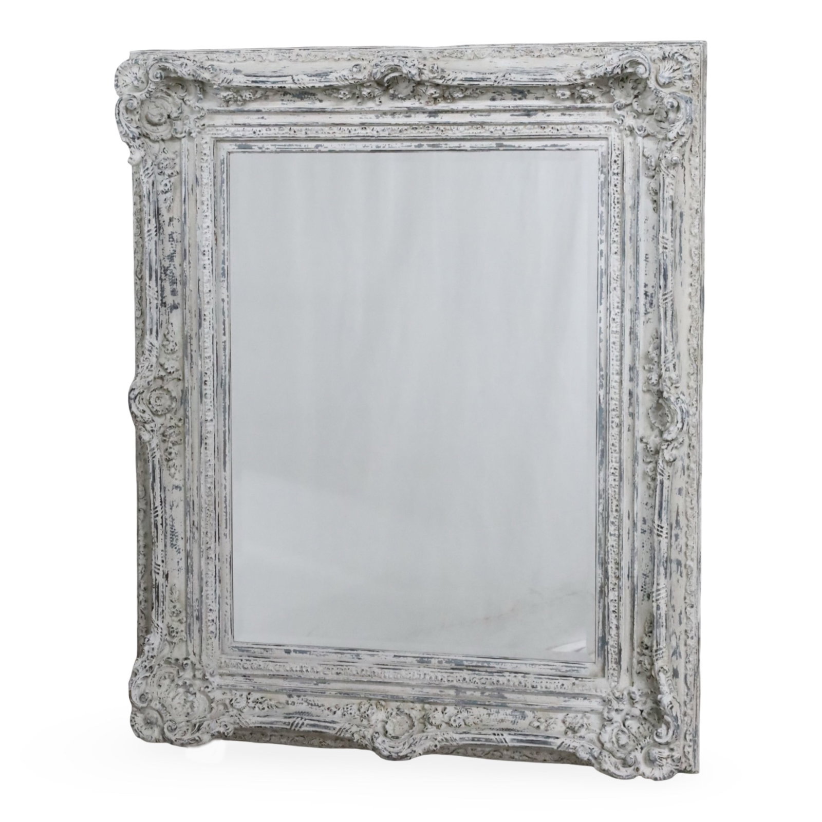 BAROQUE STYLE BEVEL GLASS MIRROR: Baroque style bevel glass mirror having distressed white ornately molded frame, 20th century; 54"H 45"W