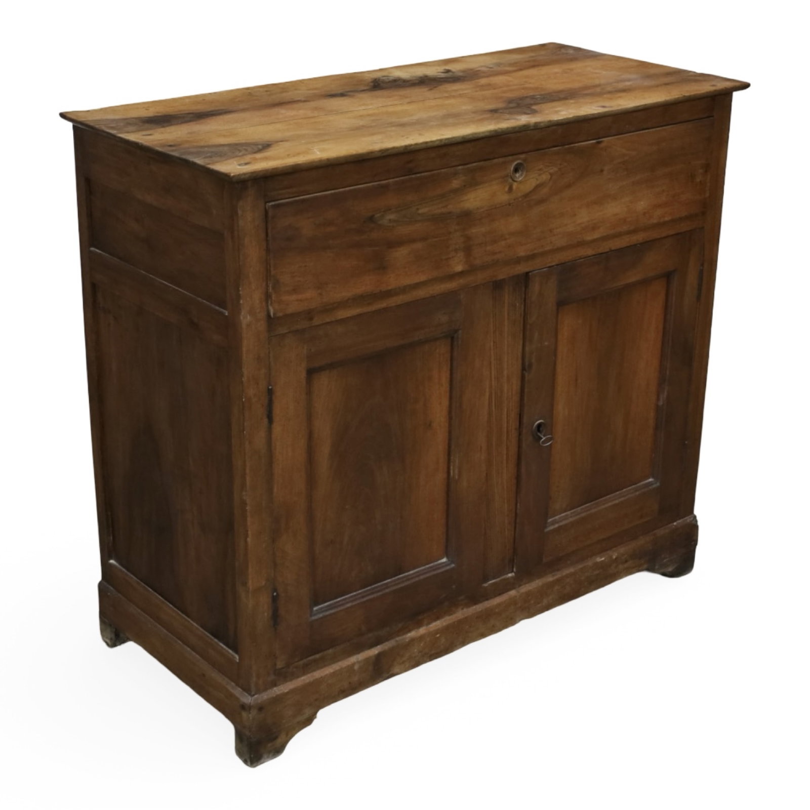FRENCH PROVINCIAL WALNUT BUFFET: French Provincial walnut buffet with one long frieze drawer above two paneled doors opening to a shelved interior. Measures 44.5"W x 20.5"D x 40"H.