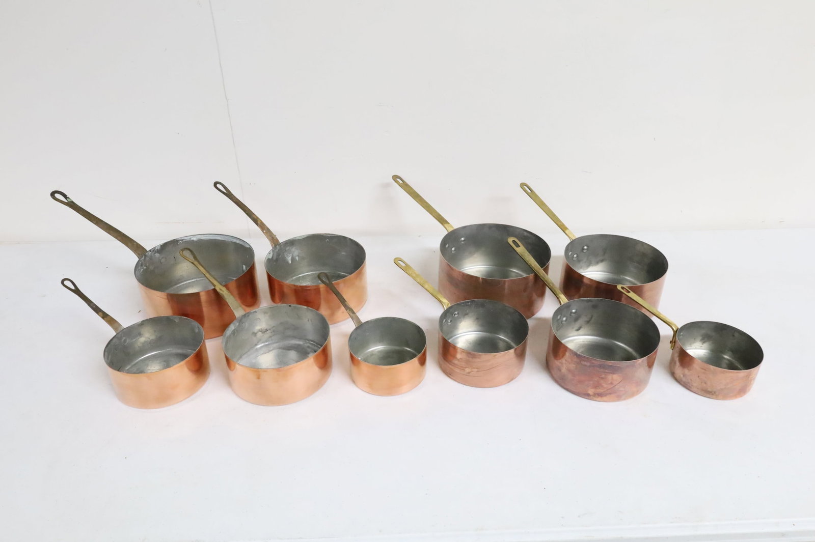 TWO 5PC GRADUATING COPPER CULINARY PANS - 2
