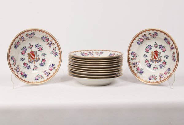 SET OF 12 AMORIAL DECORATED PORCELAIN BOWLS: SET OF 12 AMORIAL DECORATED PORCELAIN BOWLS HAVING CENTER CREST WITH LION AND HORSE SURROUNDING CORONATED TABLET READING "VIRTUS SOLA VICTA" AND HAVING IRON RED MARK ON THE REVERSE UNDER GLAZE; 9"DIA.