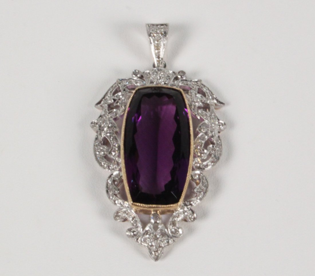 IMPRESSIVE 18K GOLD DIAMOND AND AMETHYST PENDANT: IMPRESSIVE 18K GOLD DIAMOND AND AMETHYST PENDANT HAVING 1.044 CTW DIAMONDS AND 44.18 CT AMETHYST