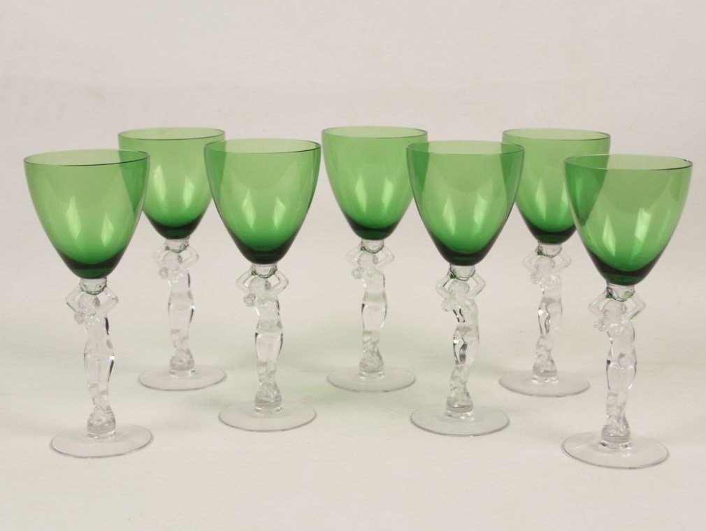 GROUP OF 7 VENETIAN GLASS GOBLETS: GROUP OF 7 VENETIAN GLASS GOBLETS WITH NUDE FIGURAL STEMS; 9"H; CONDITION: ONE WITH FAINT RIM CHIP