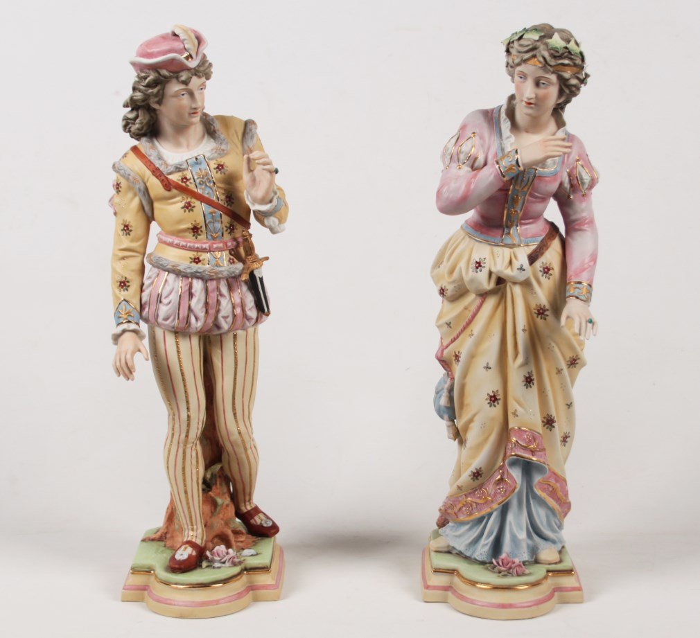 PAIR OF PORCELAIN FIGURES OF LADY AND GENT: PAIR OF WELL COSTUMED PORCELAIN FIGURES OF LADY AND GENT OF NOBILITY IN RENAISSANCE ATTIRE; 19"H; CONDITION: ON MALE FIGURE, THE TIP OF SWORD IS GONE ON THE UNDERSIDE; ON FEMALE FIGURE, MINOR CHIP TO 