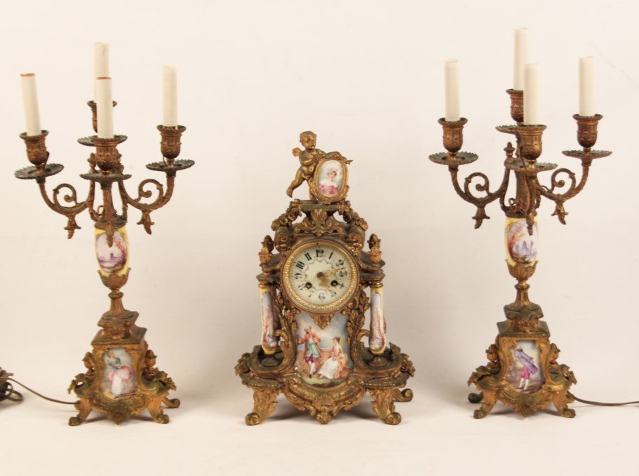 FRENCH 3 PIECE GILT METAL AND PORCELAIN CLOCK SET: FRECH 3 PIECE GILT METAL AND JAUNE PORCELAIN CLOCK SET; 22"H CANDELABRA; CONDITION: BEZEL CRACKED ON CLOCK