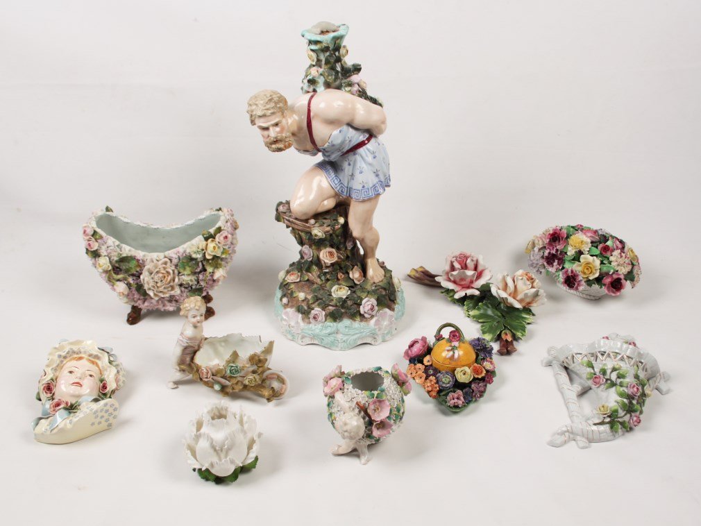 10 PIECE MISCELLANEOUS LOT OF CONTINENTAL PORCELAIN: 10 PIECE MISCELLANEOUS LOT OF CONTINENTAL PORCELAIN INCLUDING 2 WALL POCKETS, 3 FLORAL CENTER PIECES, FLORAL INKWELL, 3 PLANTERS, 1 LARGE ATLAS STYLE FIGURE (PROBABLY A BASE FOR CANDELABRA A/F); 19"H