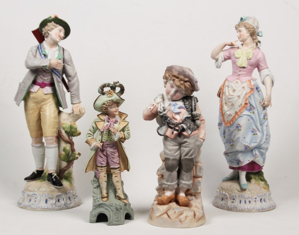 4 PIECE MISCELLANEOUS LOT OF HAND PAINTED CONTINENTAL: 4 PIECE MISCELLANEOUS LOT OF HAND PAINTED CONTINENTAL BISQUE INCLUDING A PAIR OF FIGURES OF GENT AND LADY IN COLORFUL ATTIRE, ALONG WITH 2 FIGURES OF YOUNG MEN; 21"H LADY; CONDITION: ON PAIR, LADY MIS