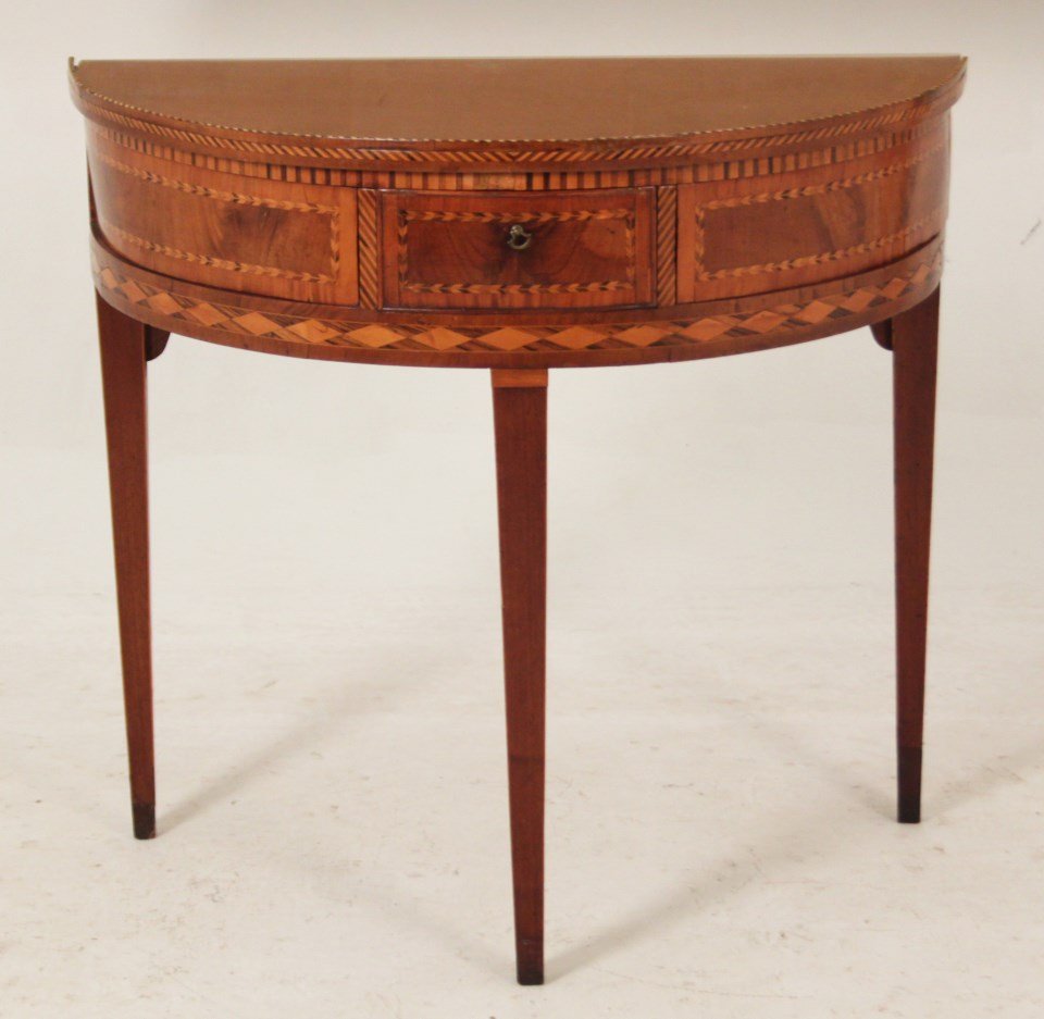CONTINENTAL INLAID WALNUT AND MAHOGANY CONSOLE: CONTINENTAL INLAID WALNUT AND MAHOGANY CONSOLE, 19TH C.; 31"H X 34"W X 17"D; CONDITION: AREAS OF LOSS TO TOP MOLDING