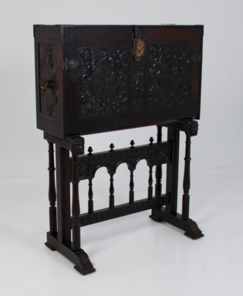 HEAVILY CARVED MAHOGANY SPANISH VARGUENO: HEAVILY CARVED MAHOGANY SPANISH VARGUENO, EARLY 20TH C.; 58"H X 42"W X 15"D