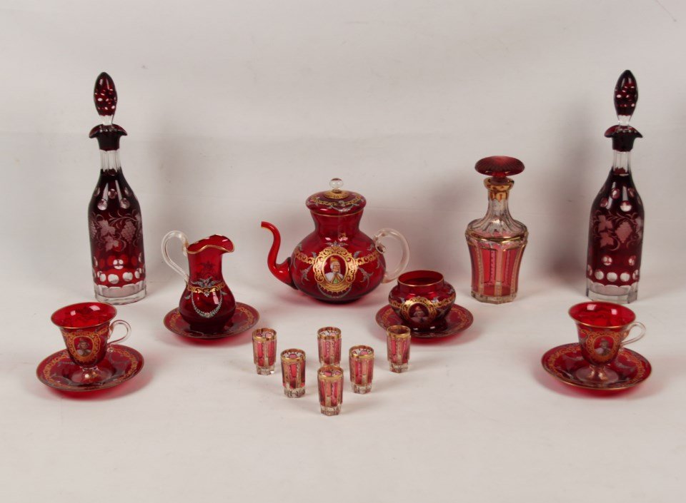 18 PIECE MISCELLANEOUS LOT OF GLASS WARE: 18 PIECE MISCELLANEOUS LOT OF GLASS WARE CONSISTING OF A RUBY GLASS TEA SERVICE WITH GOLD OVERLAY, PROBABLY BOHEMIAN WITH PAINTED PORTRAITS IN RESERVES, A CAPPED DECANTER WITH 6 MATCHING CORDIALS, A P