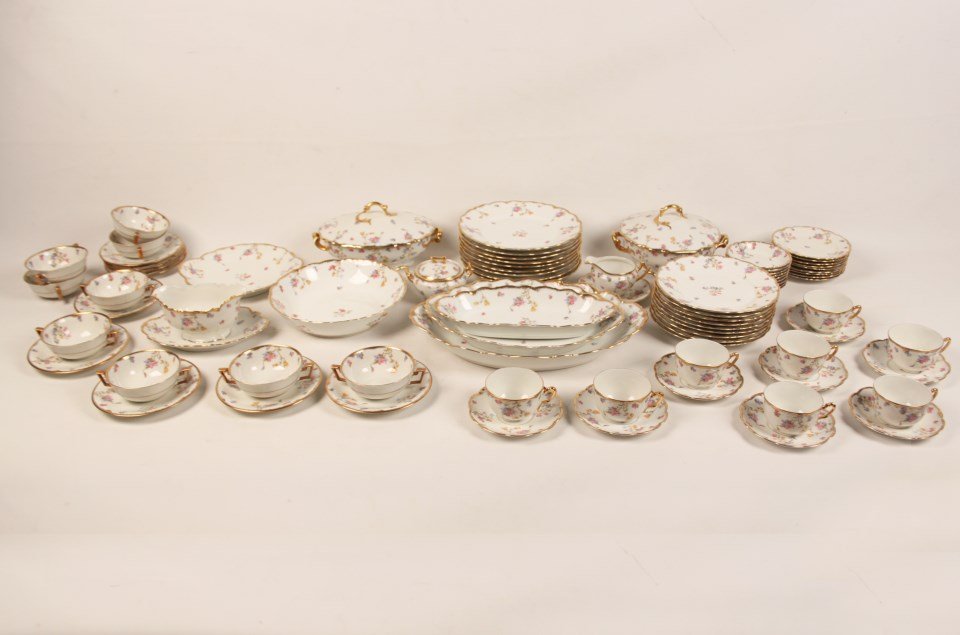 81 PIECE FRENCH LIMOGES PORCELAIN DINNER SERVICE: 81 PIECE FLORAL DECORATED AND GOLD RIMMED FRENCH LIMOGES PORCELAIN HAND PAINTED DINNER SERVICE CONSISTING OF 9-10" DINNER PLATES, 9-9" LUNCHEON POATES, 9-7" SAUCERS, 9-4.75" HANDLED BOWLS, 9-6.5" BREA